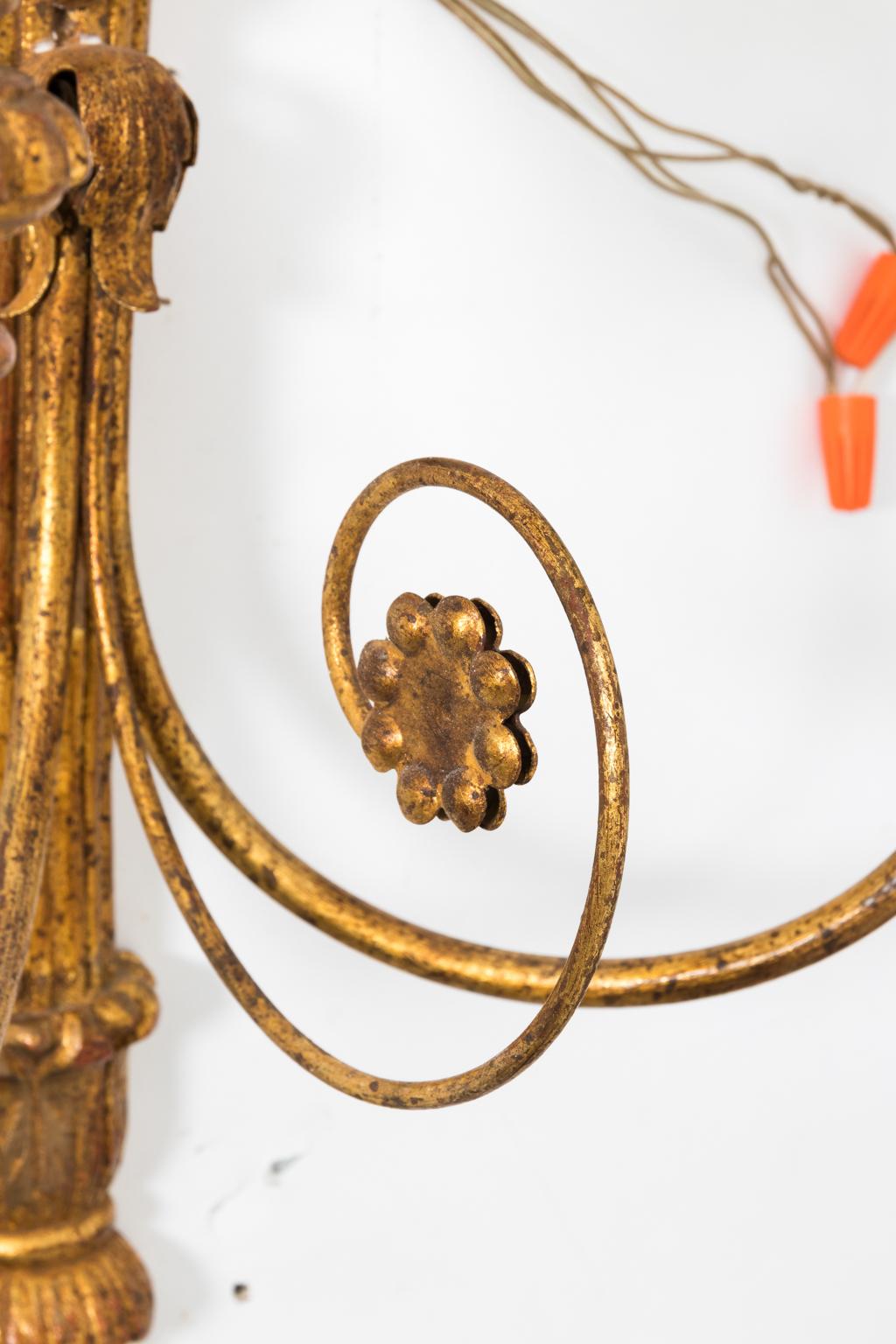 Carved Pair of Gilded Sconces