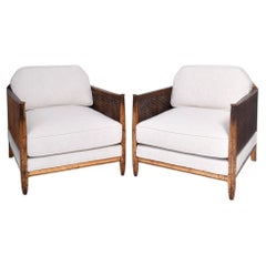 Pair of gilded wood and caning armchairs, 1930s.