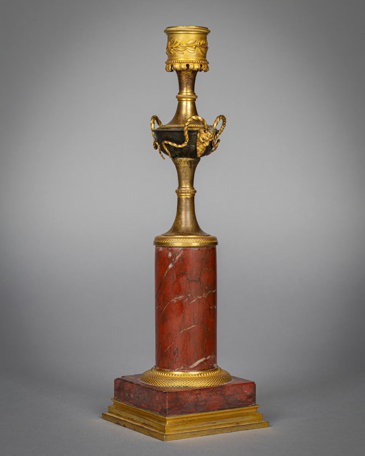 Early 19th Century Pair of Gilt and Patinated Bronze and Rouge Marble Candlesticks, circa 1820 For Sale
