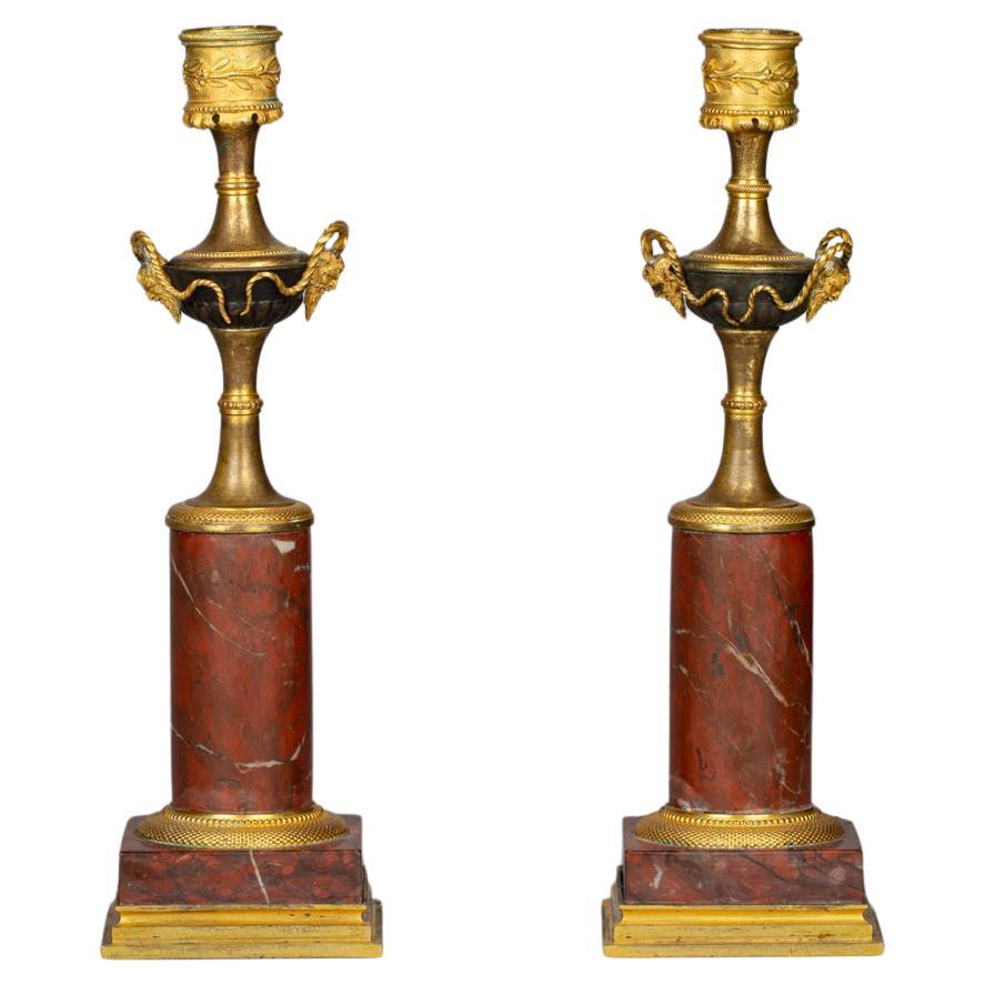 Pair of Gilt and Patinated Bronze and Rouge Marble Candlesticks, circa 1820 For Sale