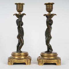Pair of Gilt and Patinated Bronze Candlesticks, 19th Century, Louis XVI Style.