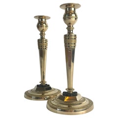 Pair of Gilt and Patinated Bronze Candlesticks. Directoire, Late 18th Century