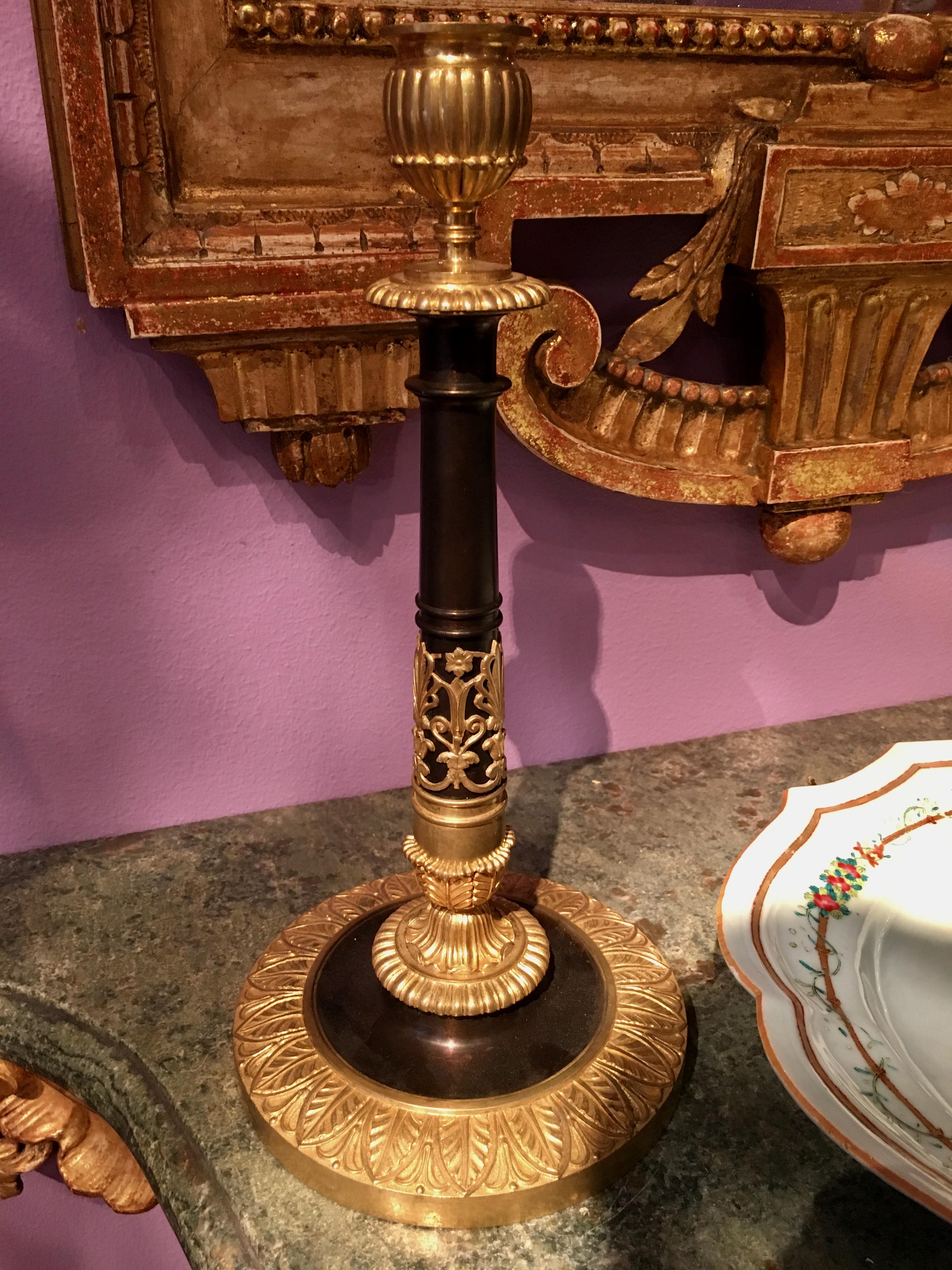 French Pair of Gilt and Patinated Bronze Candlesticks, Early 19th Century For Sale