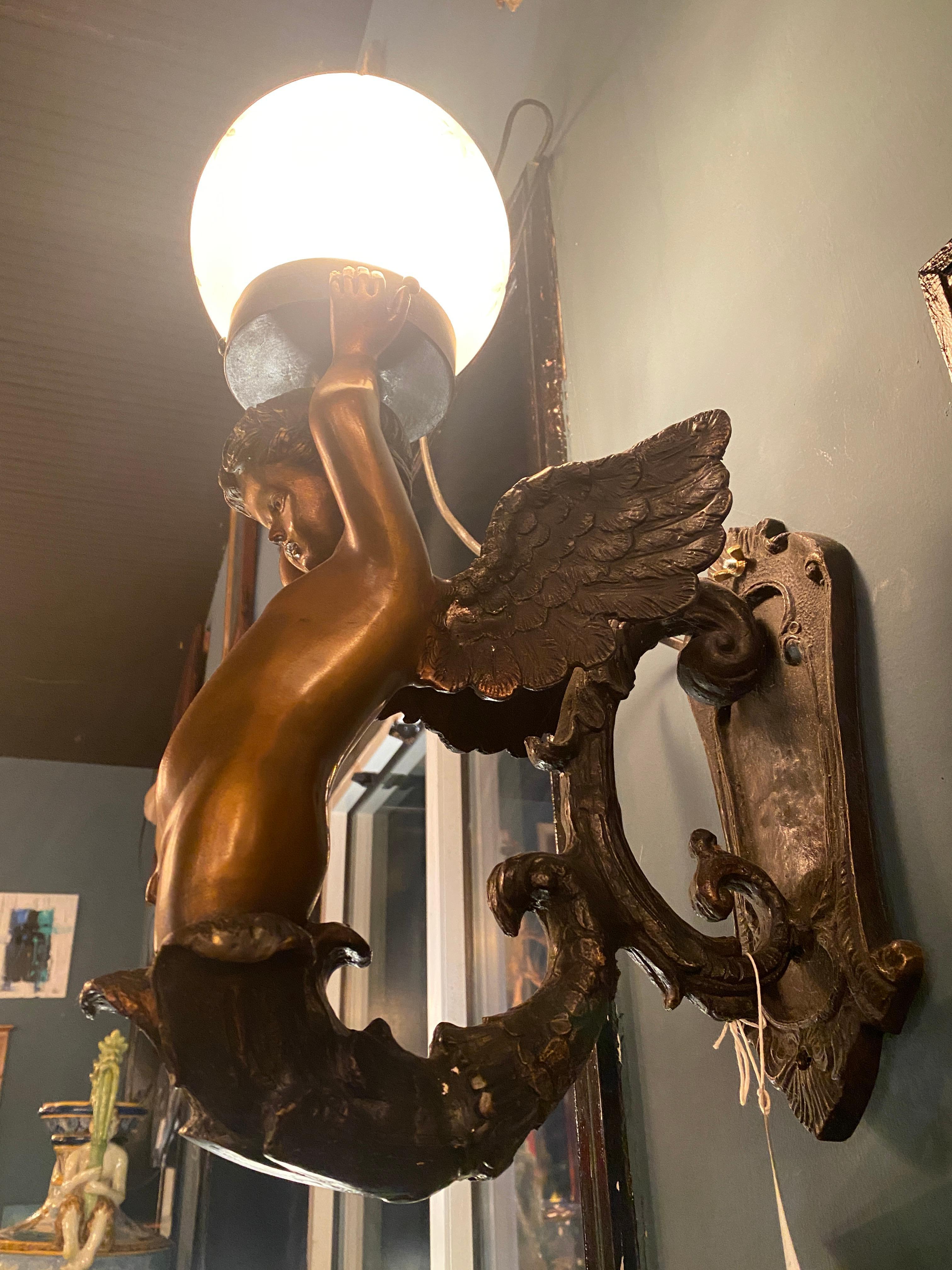 cherub sconces