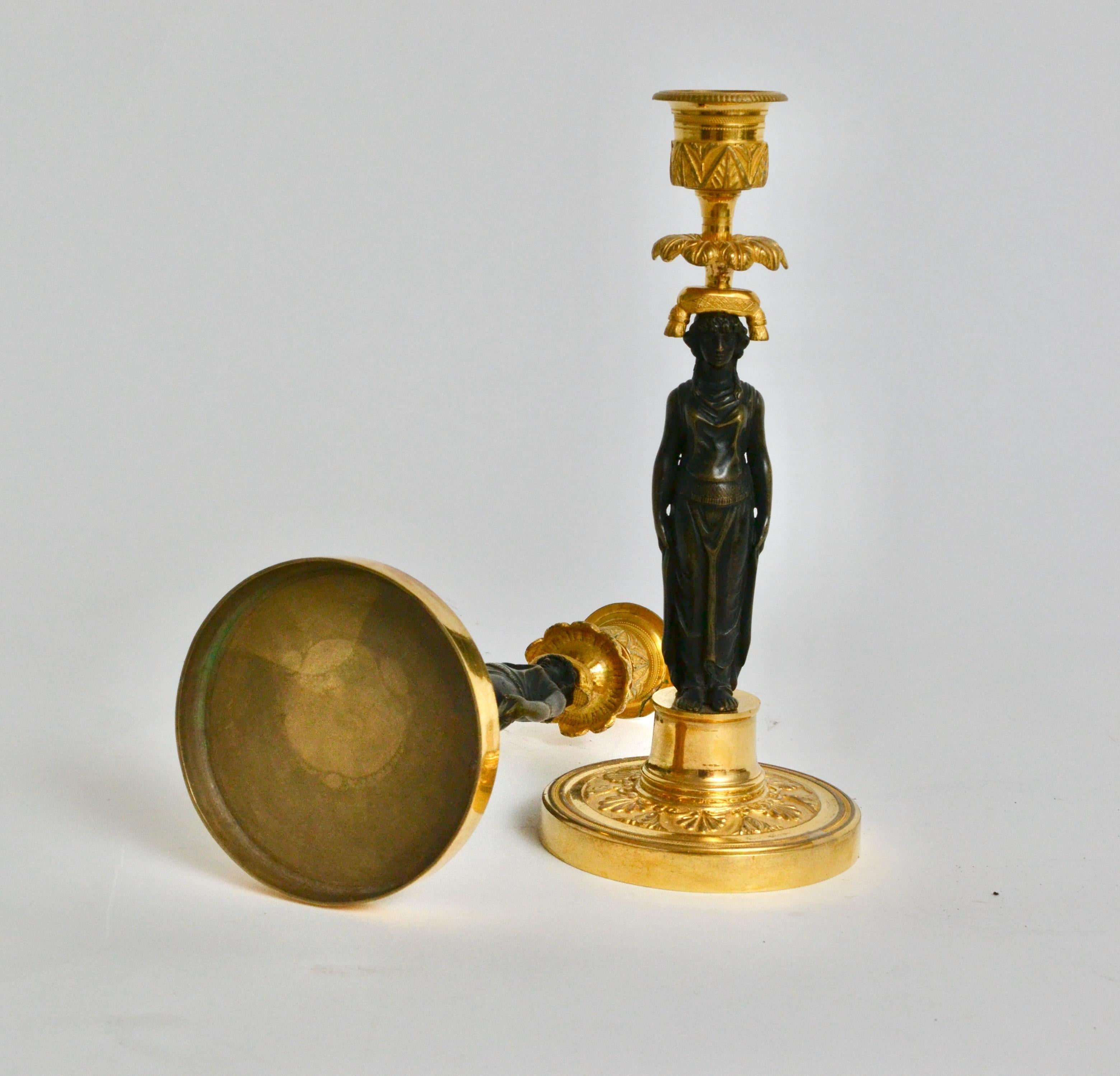 Pair of Gilt and Patinated Bronze Empire Candlesticks.  1