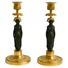 Pair of Gilt and Patinated Bronze Empire Candlesticks. 