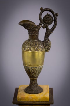 Pair of Gilt and Patinated Bronze Ewers on Marble Plinths, circa 1840