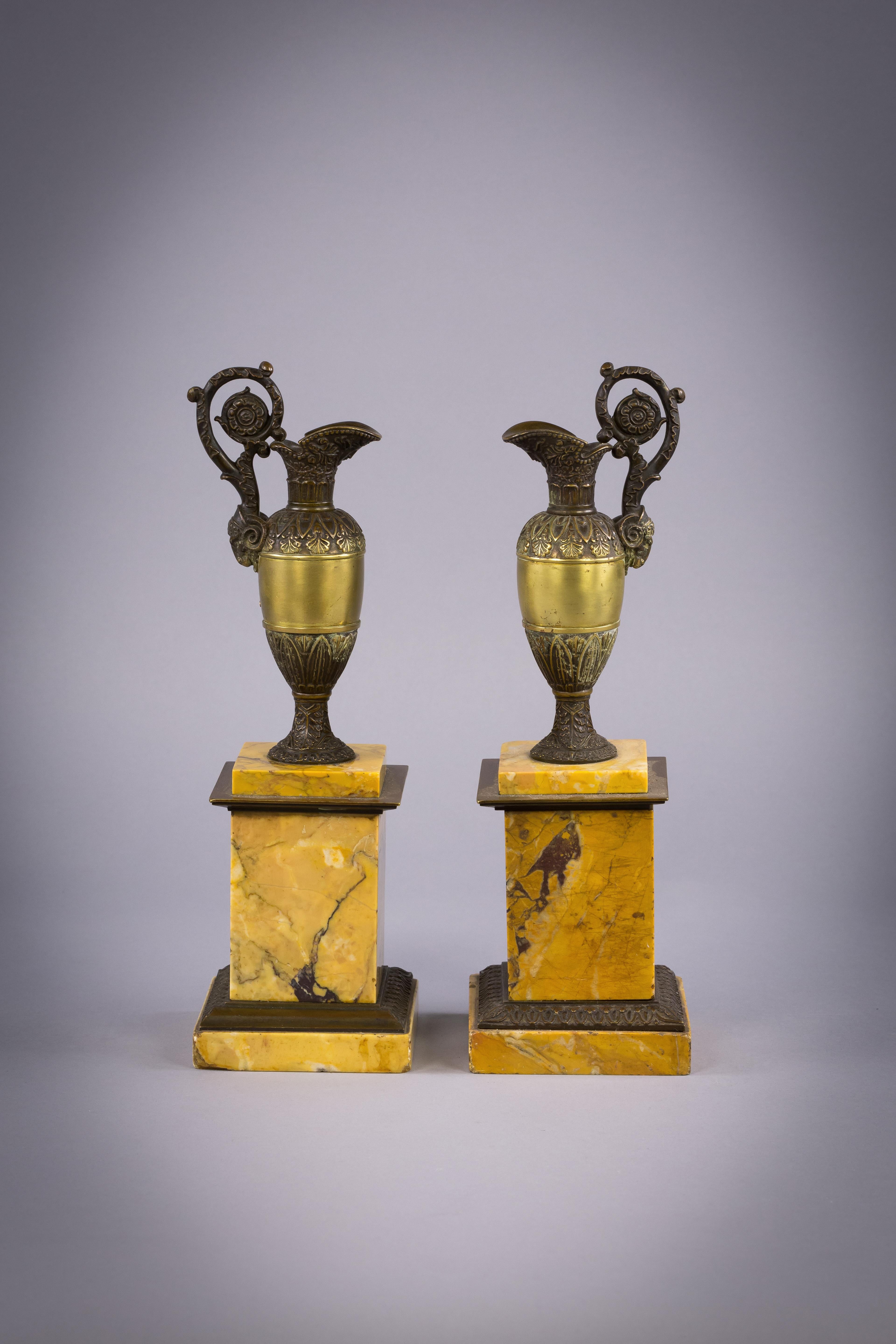 Pair of Gilt and Patinated Bronze Ewers on Marble Plinths, circa 1840 In Good Condition For Sale In New York, NY