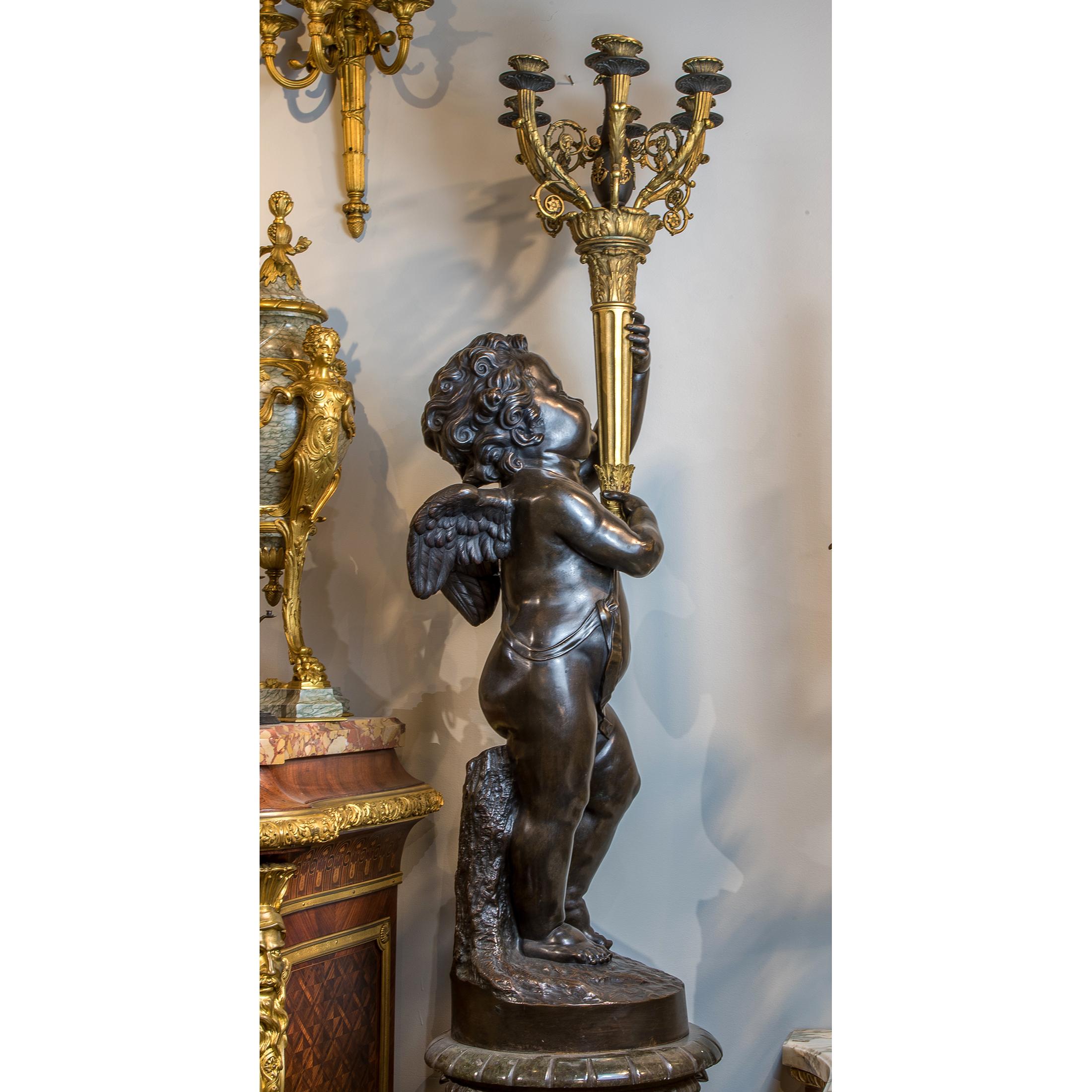 French Pair of Gilt and Patinated Bronze Putti Torchères and Marble Pedestals For Sale