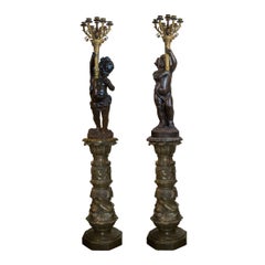 Pair of Gilt and Patinated Bronze Putti Torchères
