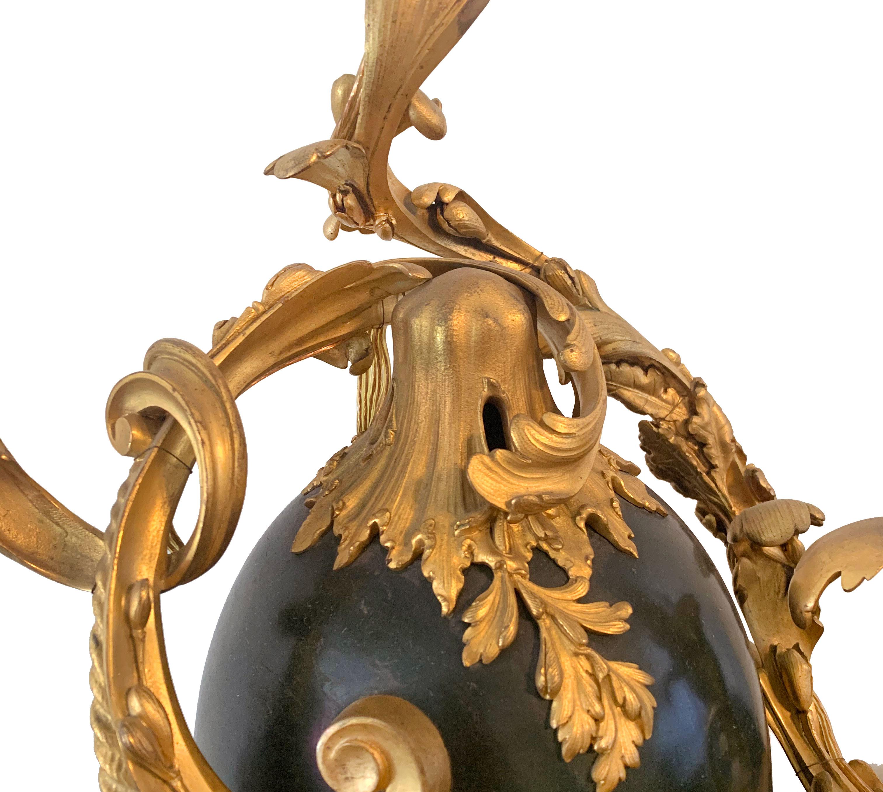 Louis XV Pair of Gilt and Patinated Bronze Three Light Candelabras by Henry Dasson