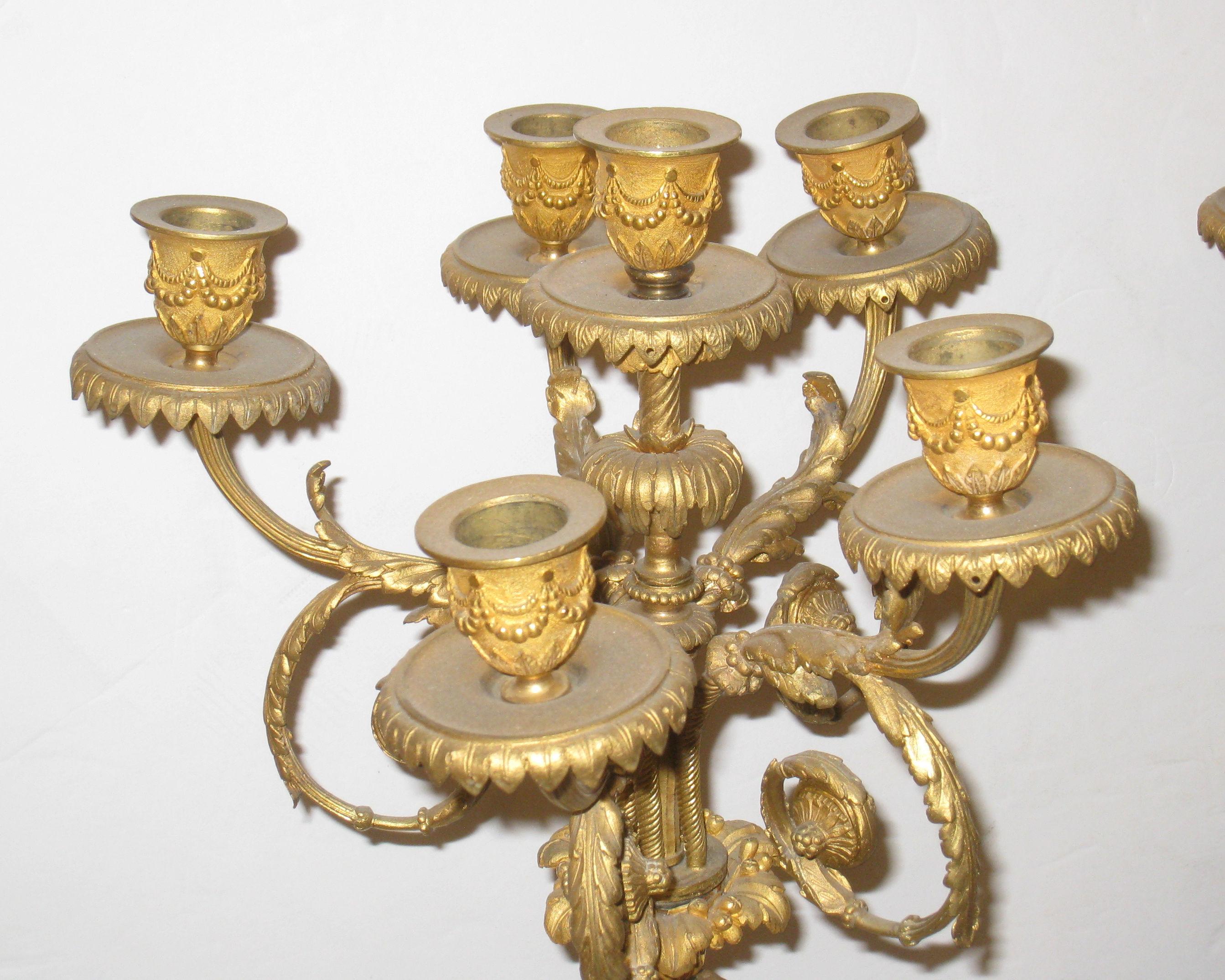 Carved Pair of Gilt and Patinated Figural Bronze and Marble Candelabras