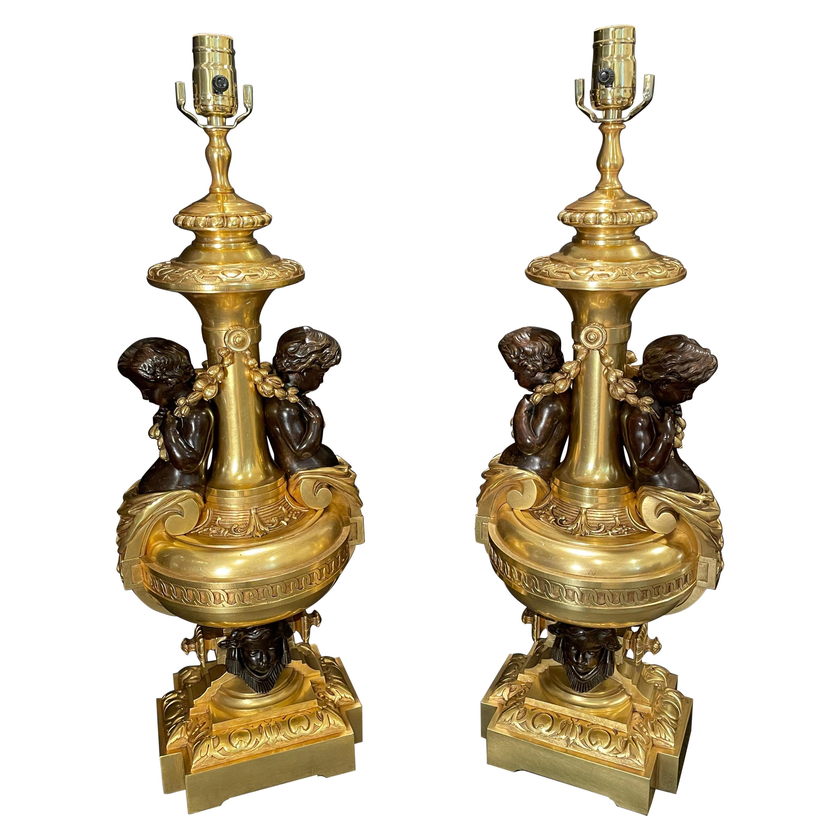 Pair of Gilt and Patinated Putti Lamps