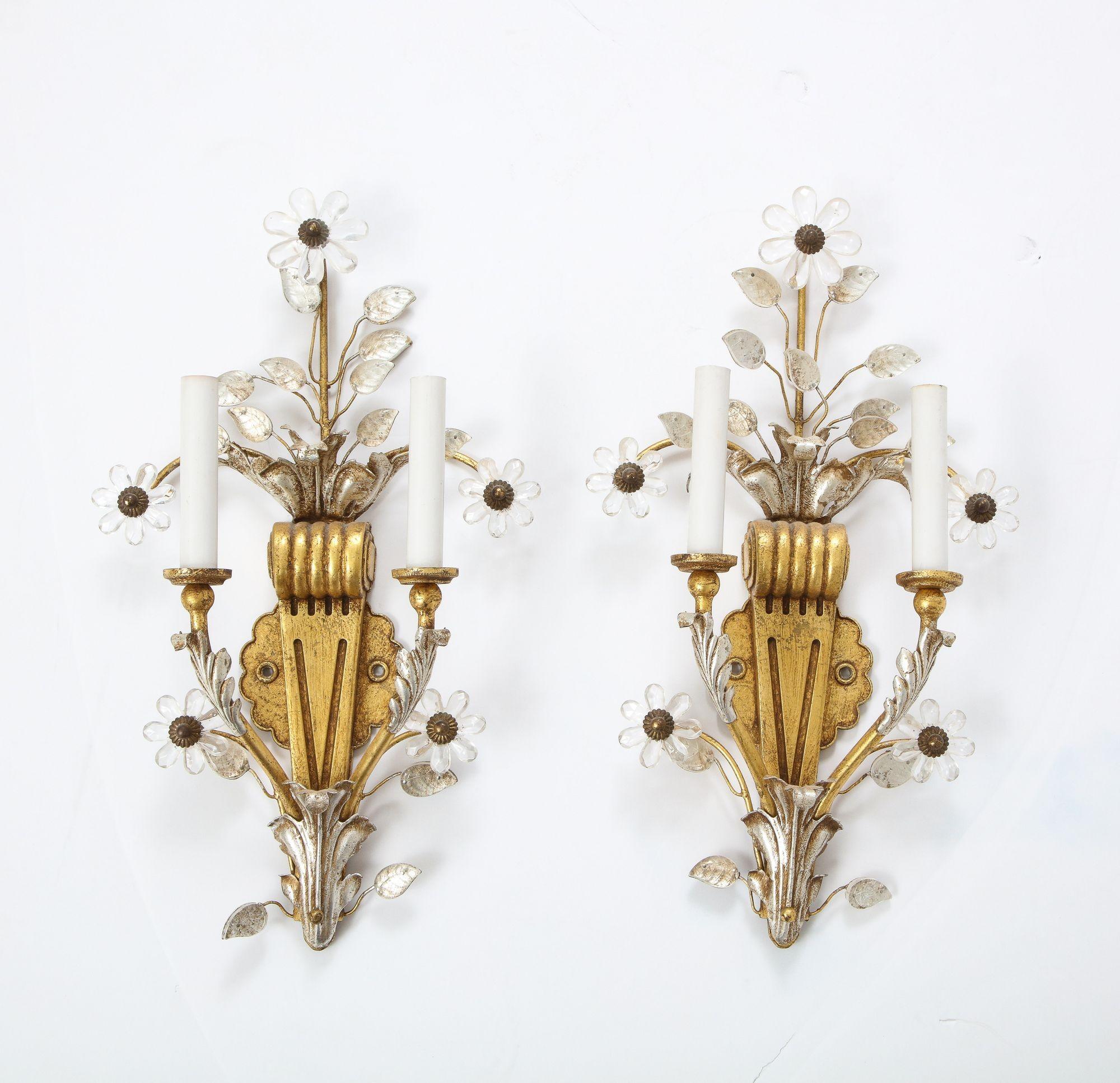 A beautiful pair of Gilt and Silvered Hollywood Regency Signed Banci Sconces with Rock Crystal Floral Motif.