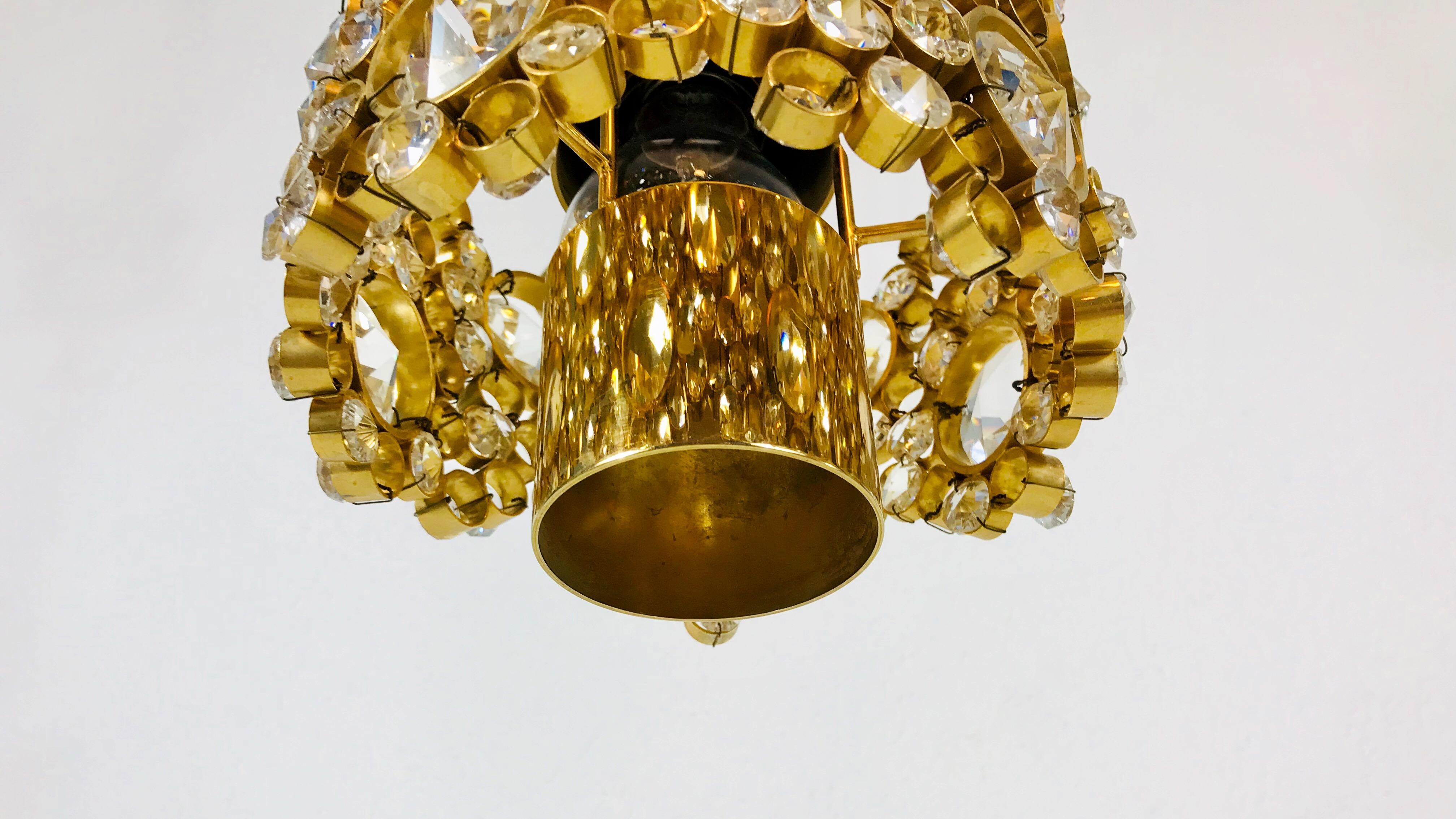 Pair of Gilt Brass and Crystal Glass Chandeliers by Palwa, Germany, 1970s For Sale 12