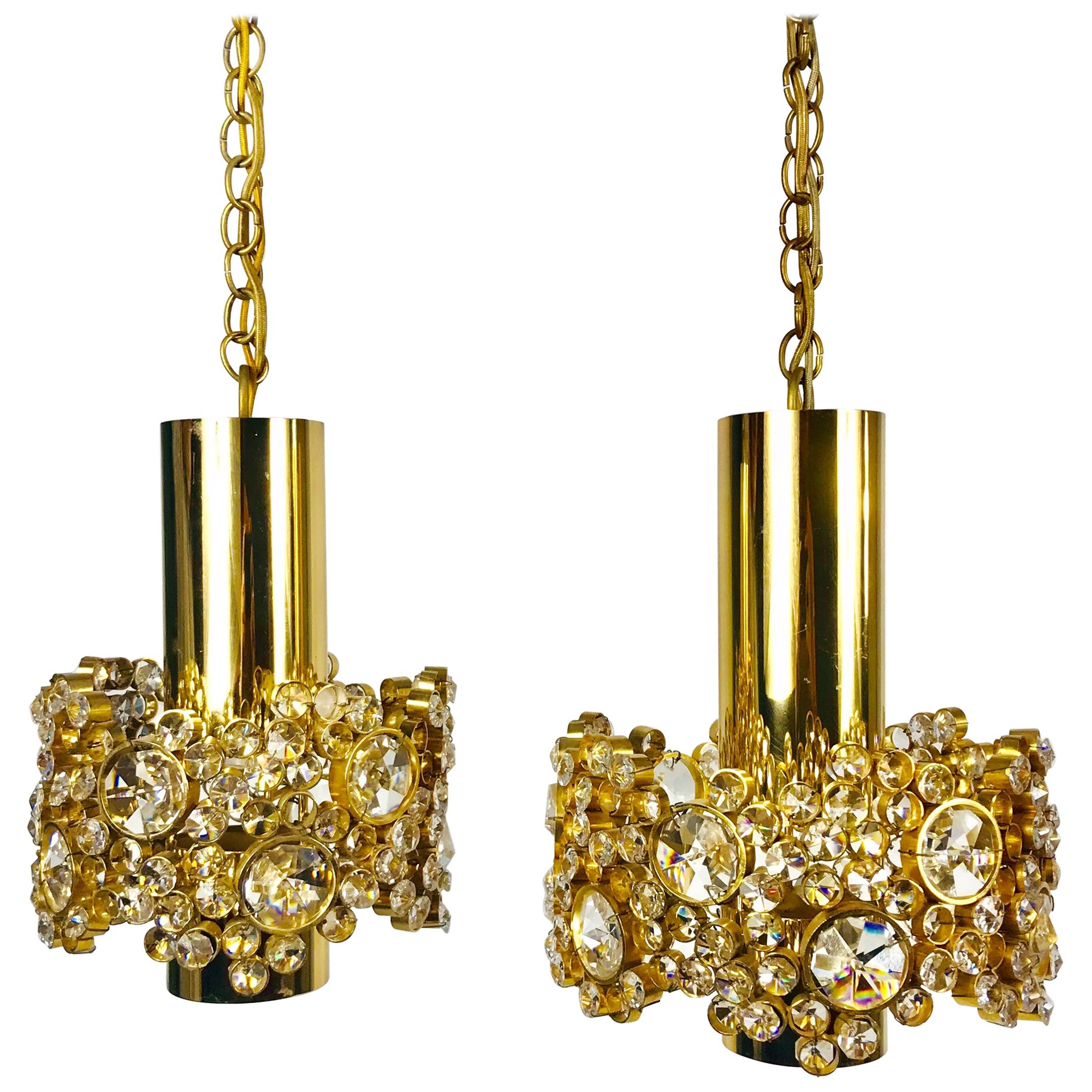Pair of Gilt Brass and Crystal Glass Chandeliers by Palwa, Germany, 1970s For Sale