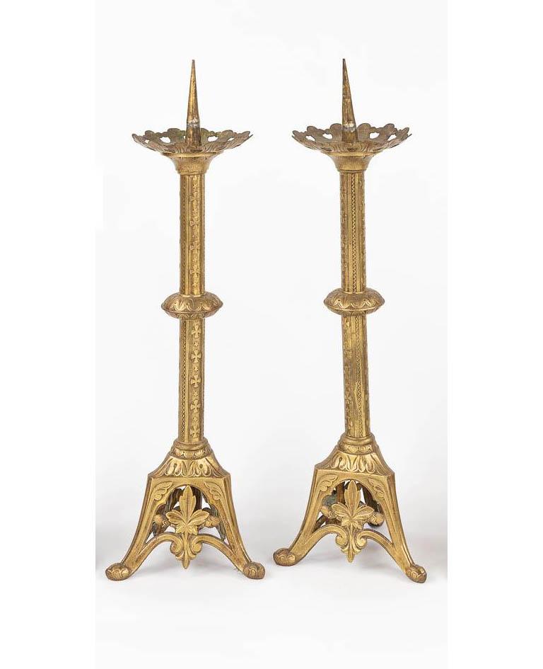 Pair of gilt brass European Gothic Revival pricket candlesticks 

Anonymous
Europe; probably early 20th century
Gilt Brass

Approximate size: 22 (h) x 6 (w) x 5 (d) in.

This pair of nicely cast and chased brass candlesticks feature a