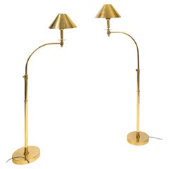 Coppia di lampade da lettura in ottone dorato, CIRCA 1970.