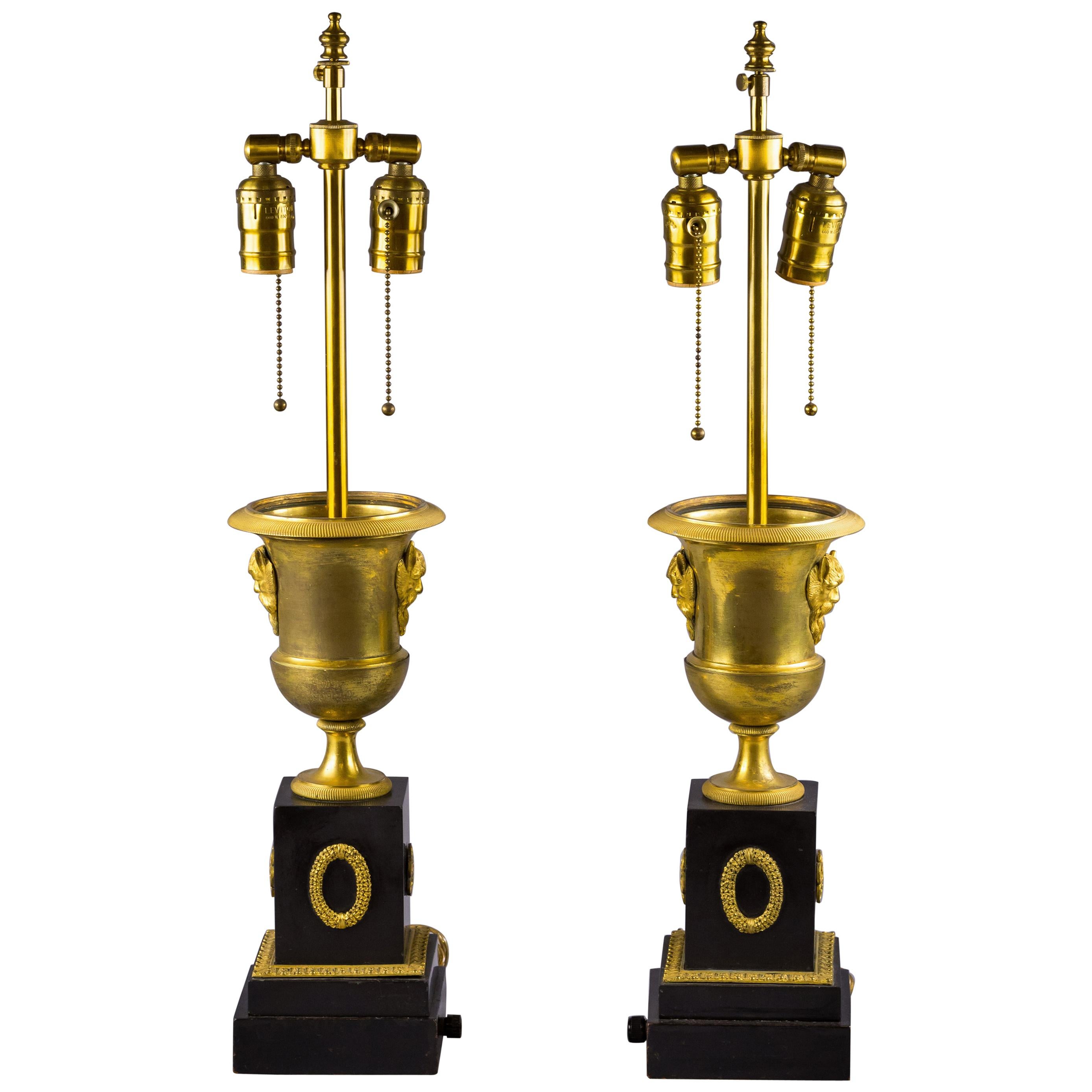 Pair of Gilt Bronze and Black Marble Lamps, circa 1840 For Sale