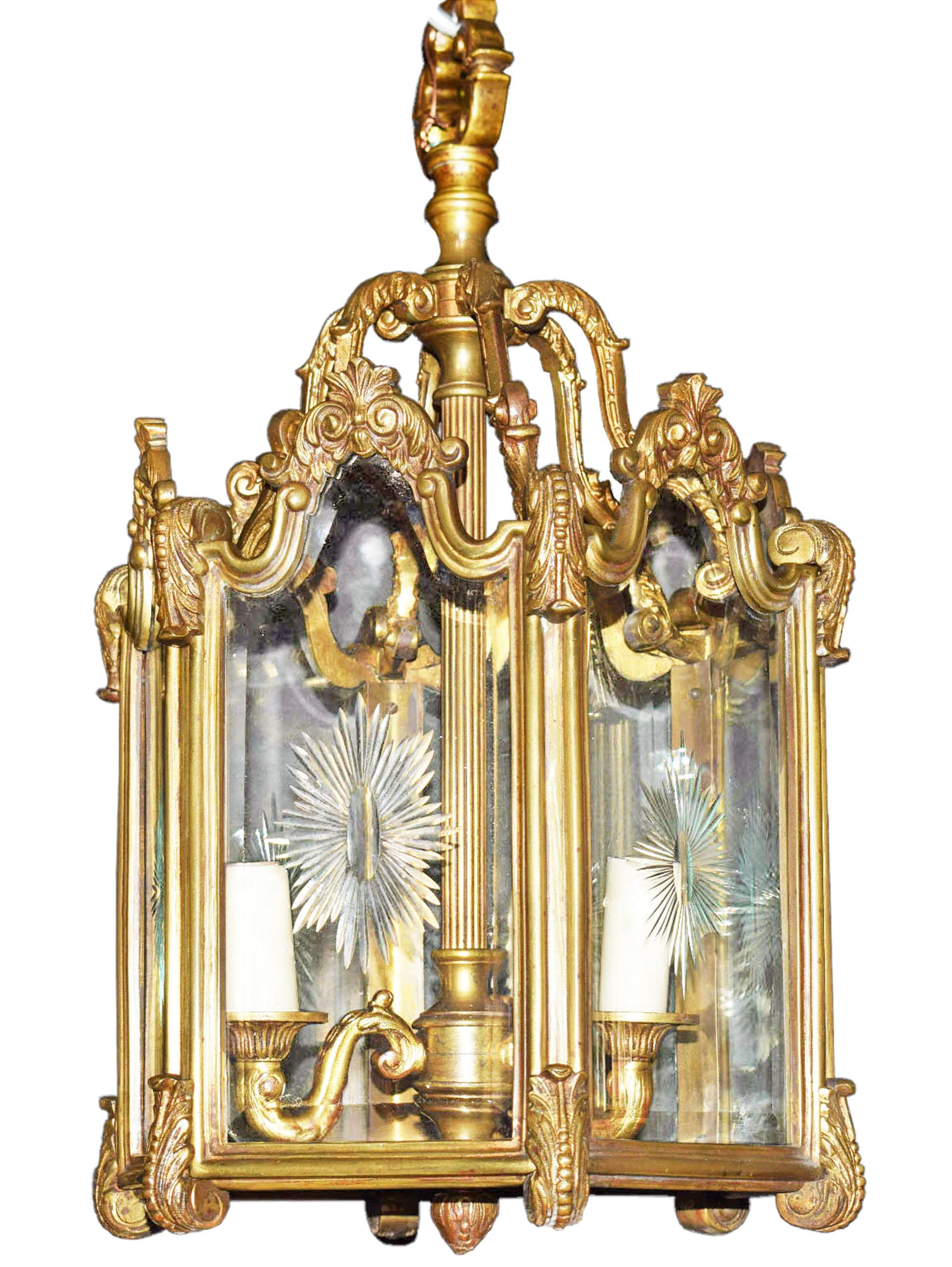 Pair of gilt bronze and crystal lanterns. Hexagonal form. Etched glass panels.
France, circa 1920. Three lights. Could be sold individually.
Dimensions: Height 20