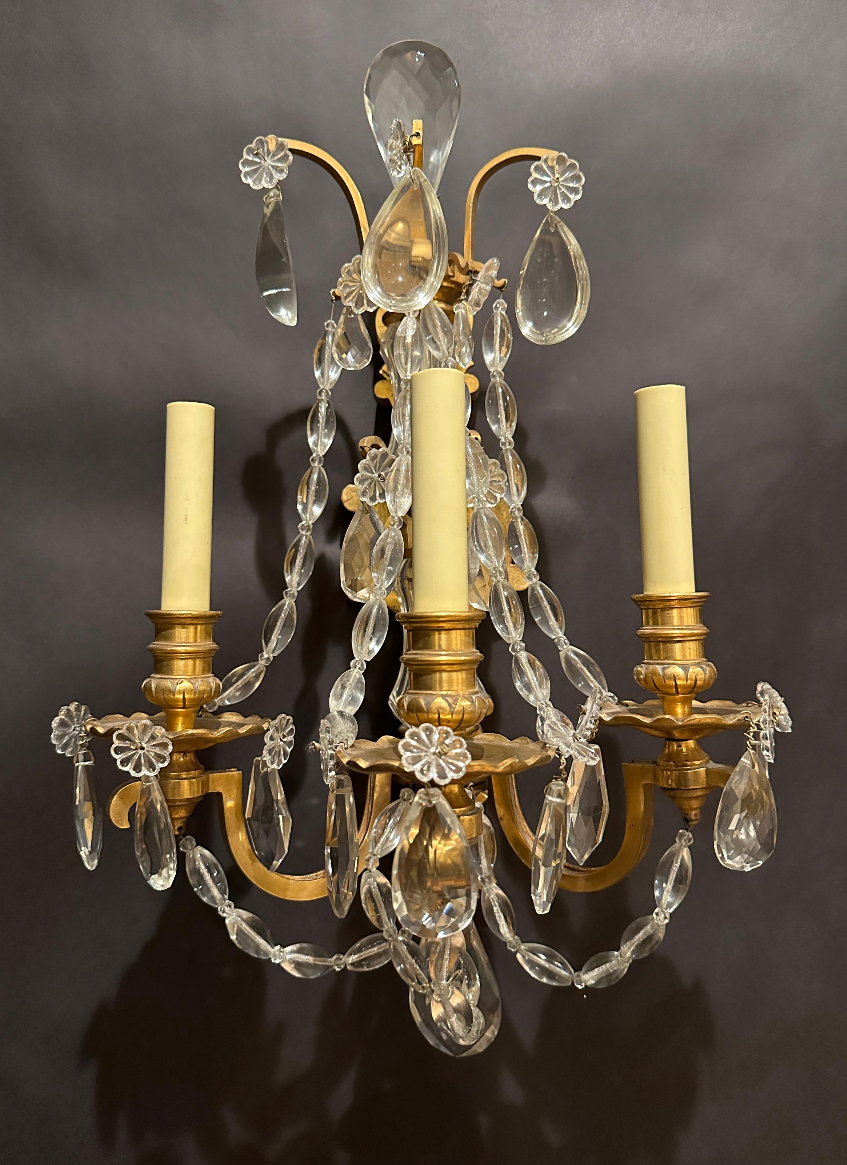 French Pair Of Gilt Bronze And Crystal Sconces For Sale