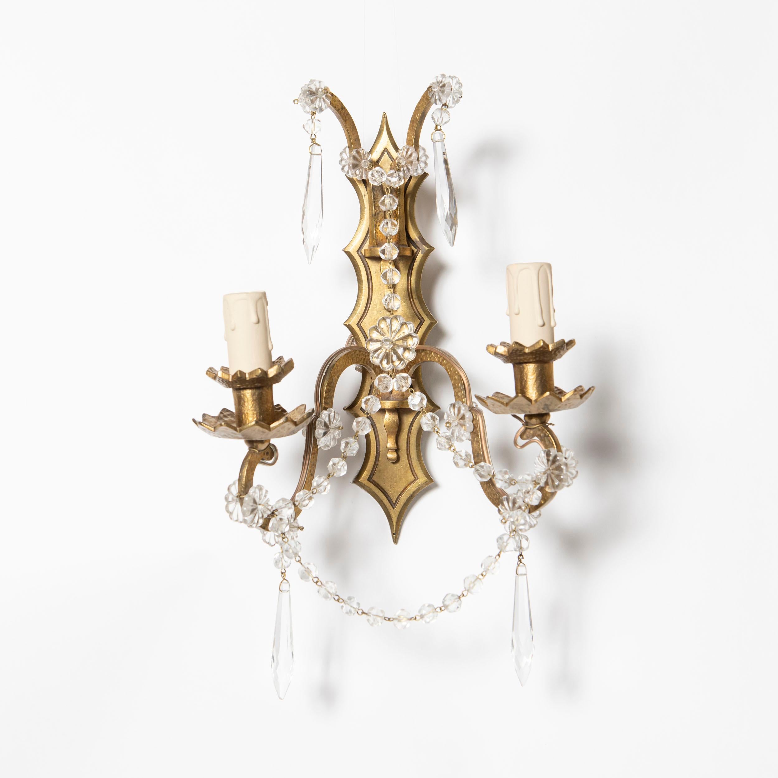 Pair of gilt bronze and crystal sconces signed Sabino France, circa 1940.