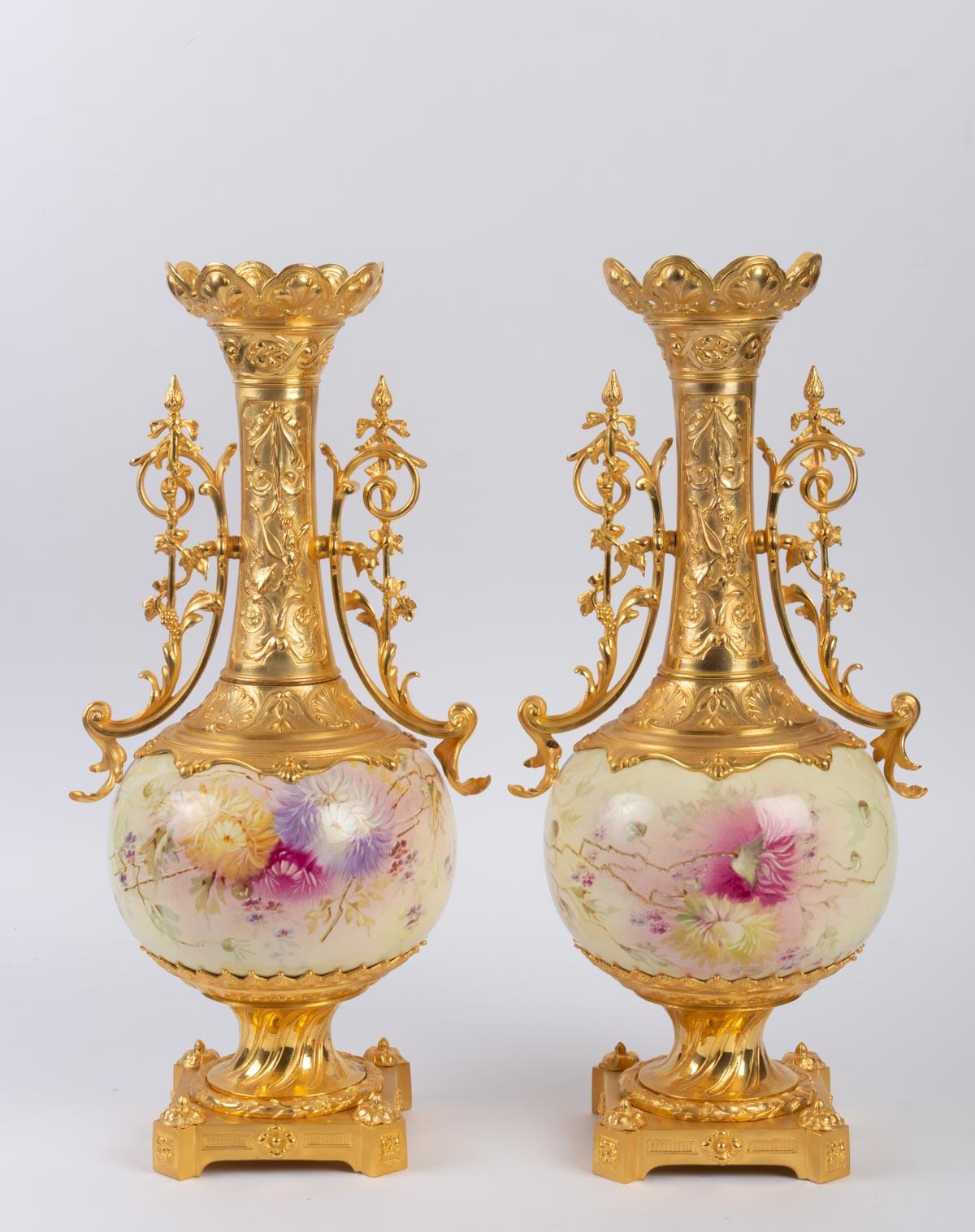 Pair of gilt bronze and painted porcelain vases, Napoleon III period, 19th century.
Measures: H 45 cm, W 23 cm, D 19 cm.