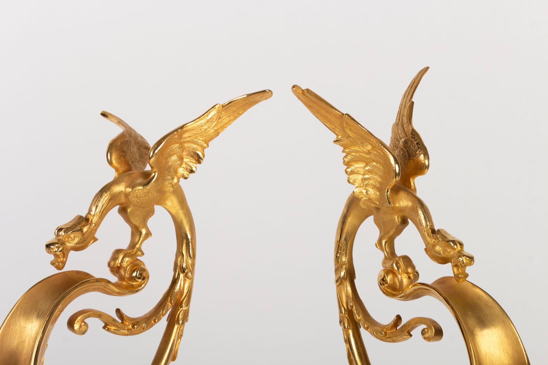 Pair of Gilt Bronze and Porcelain Ewers Topped with a Winged Dragon 1