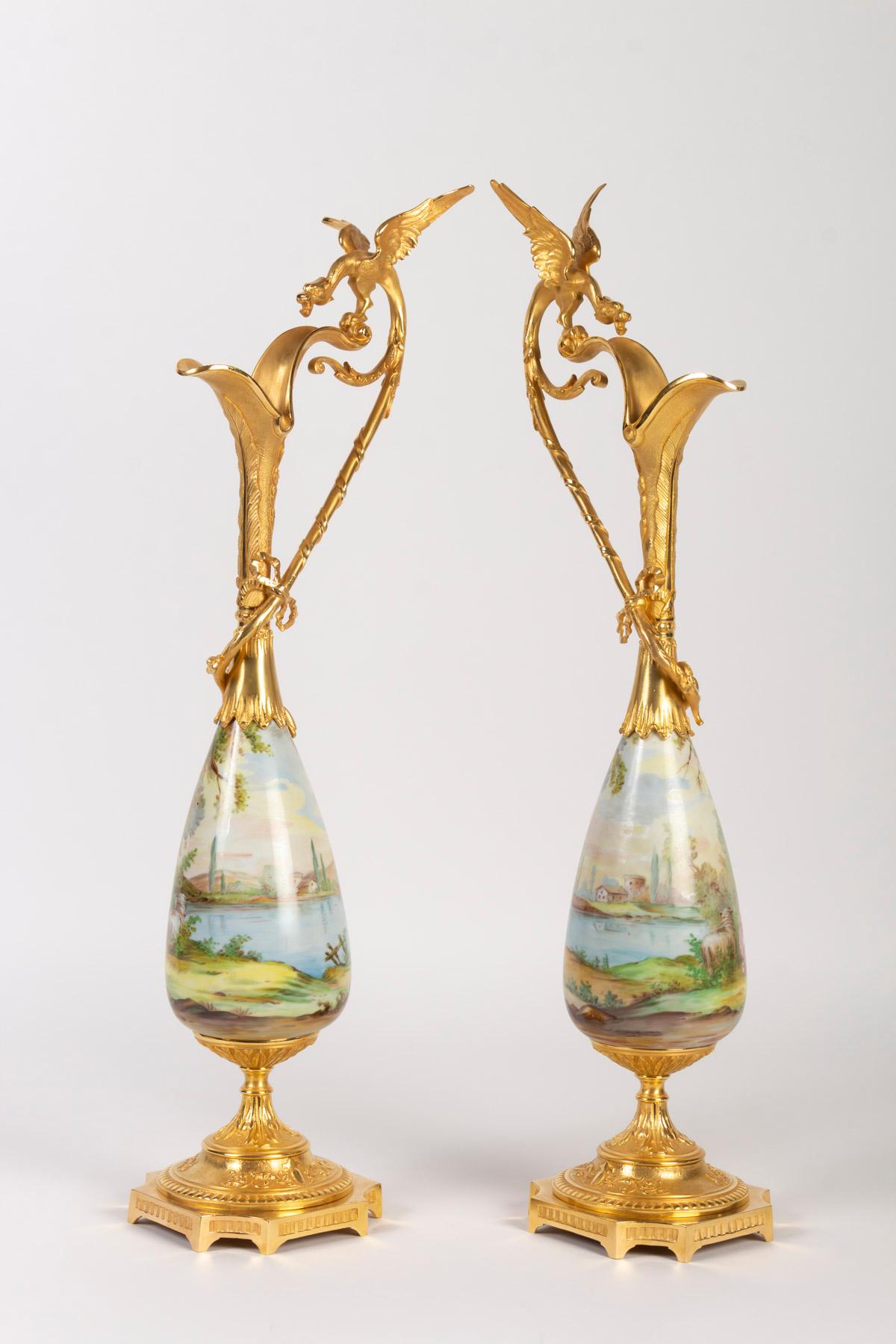 Pair of Gilt Bronze and Porcelain Ewers Topped with a Winged Dragon 2