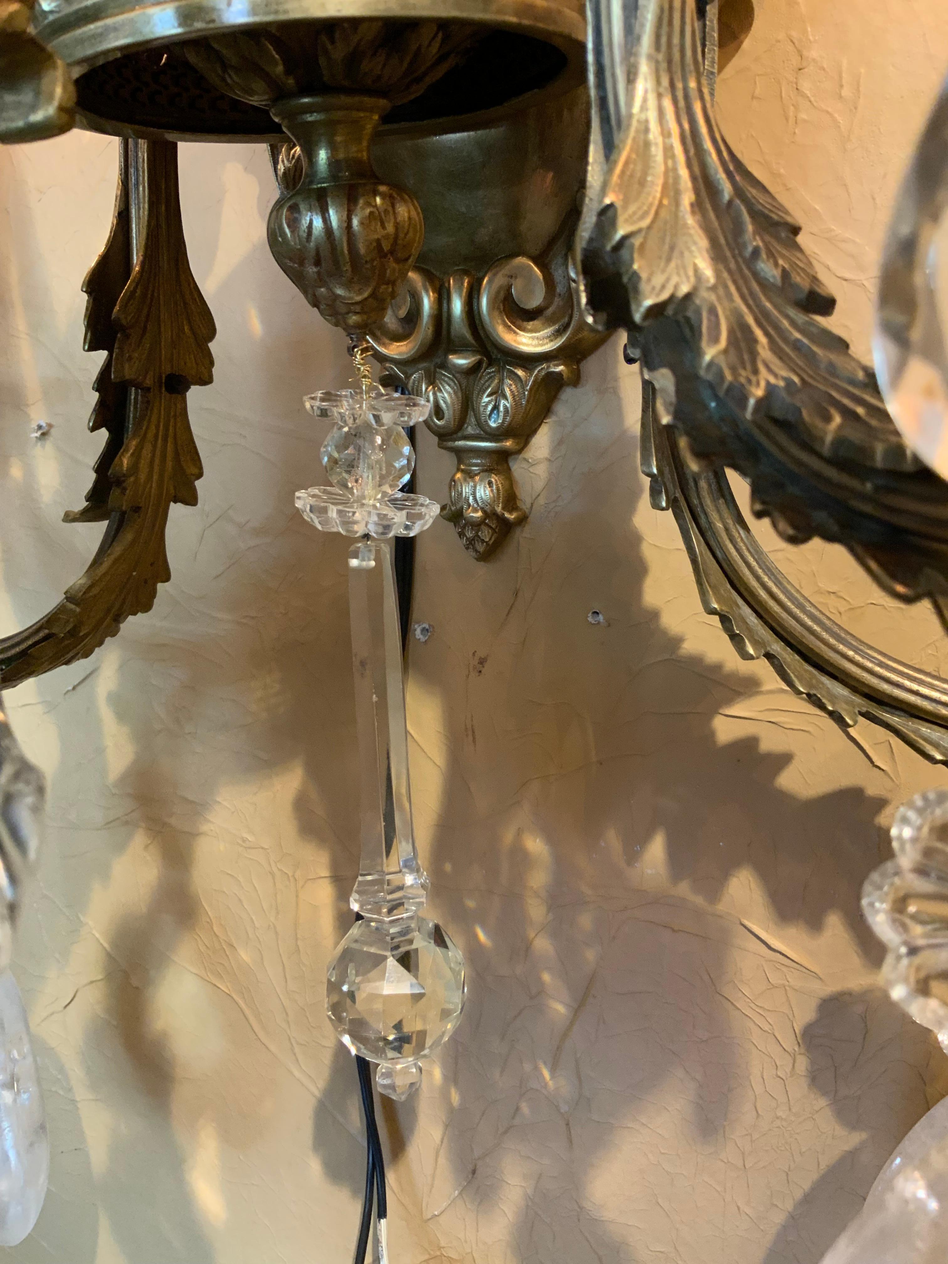 Pair of gilt bronze and rock  crystal Four light wall sconces In Excellent Condition For Sale In Houston, TX
