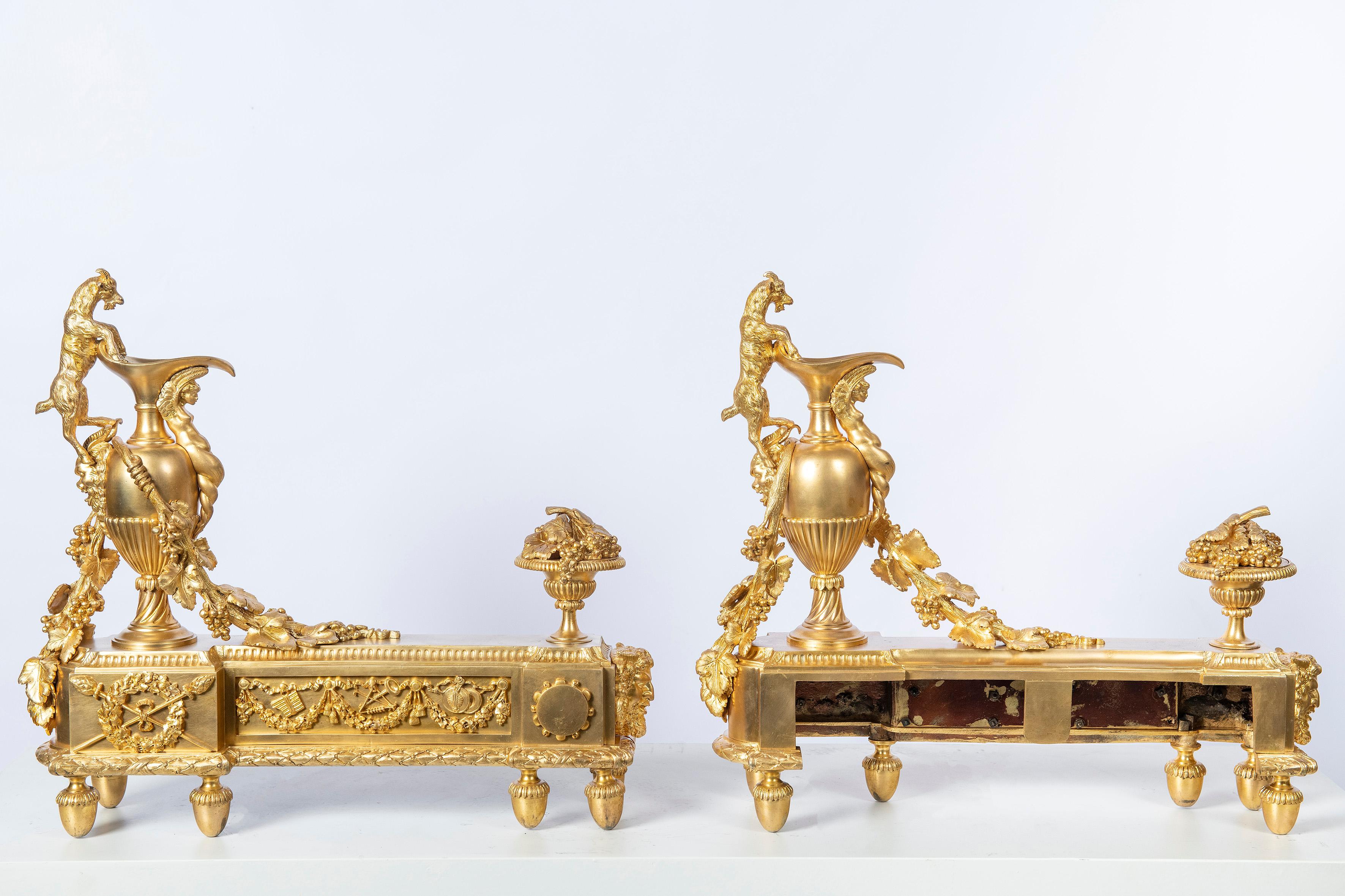Pair of gilt bronze andirons signed E. Mottheu, France, late 19th century.