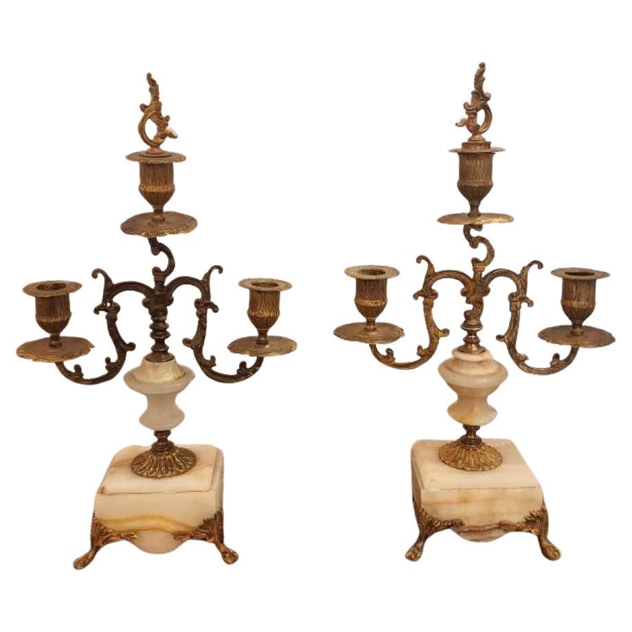 Paire de candélabres en bronze doré avec base en marbre