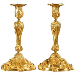 Pair of Gilt Bronze Candlesticks Decorated with Foliage and Animals