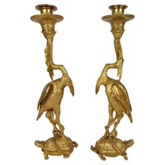 Coppia di candelabri cicogna in bronzo dorato di Christopher Fratin