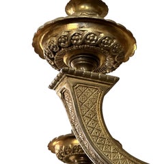 Coppia di lampadari in bronzo dorato, venduti singolarmente