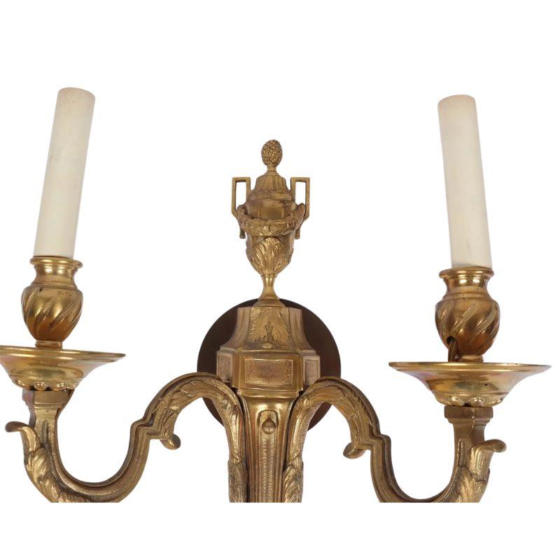 Pair of Gilt Bronze Double Arm Louis XVI Style Sconces In Good Condition For Sale In Locust Valley, NY