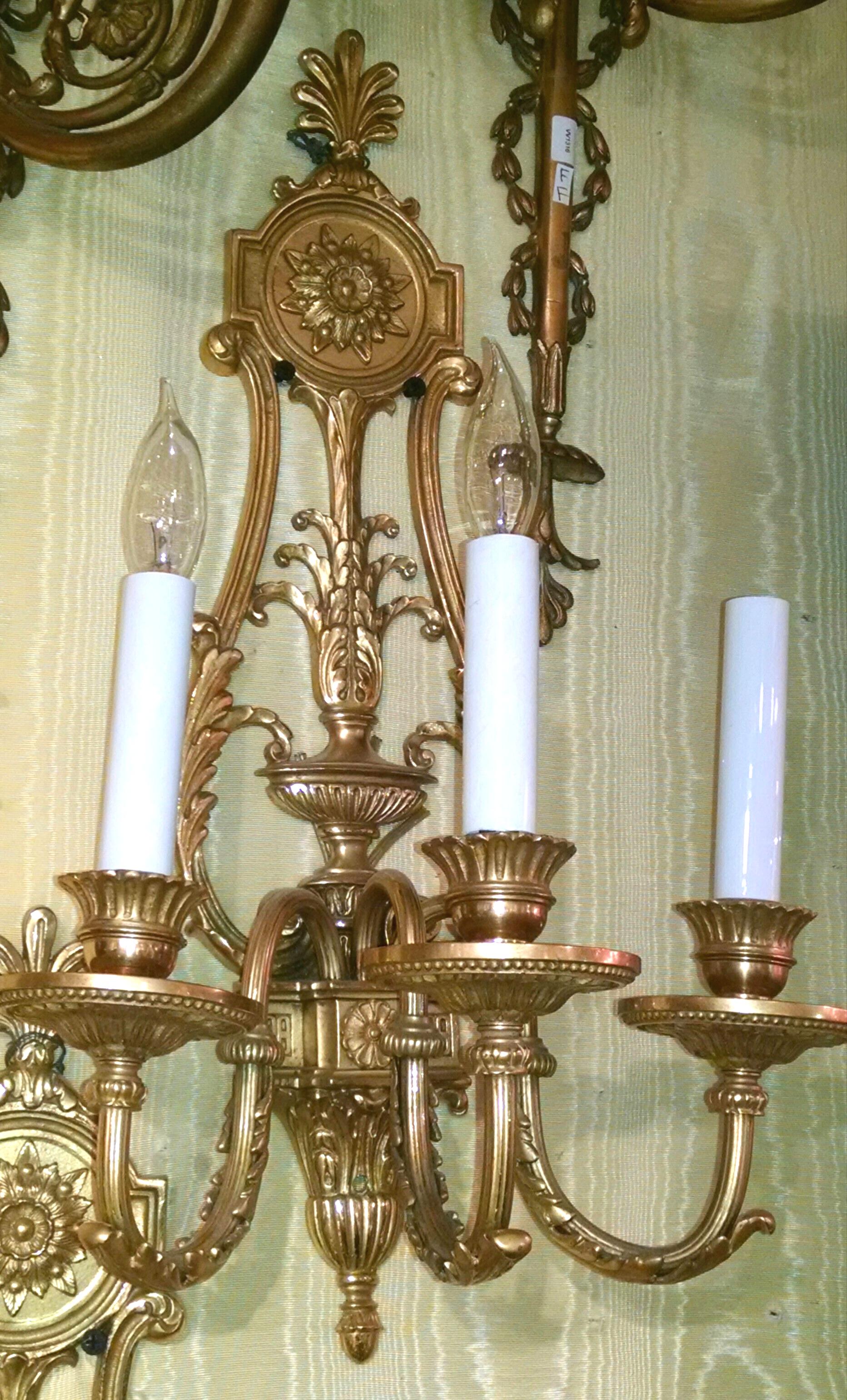 French Pair of Gilt Bronze Louis XVI Style Three-Arm Wall Light Sconces For Sale