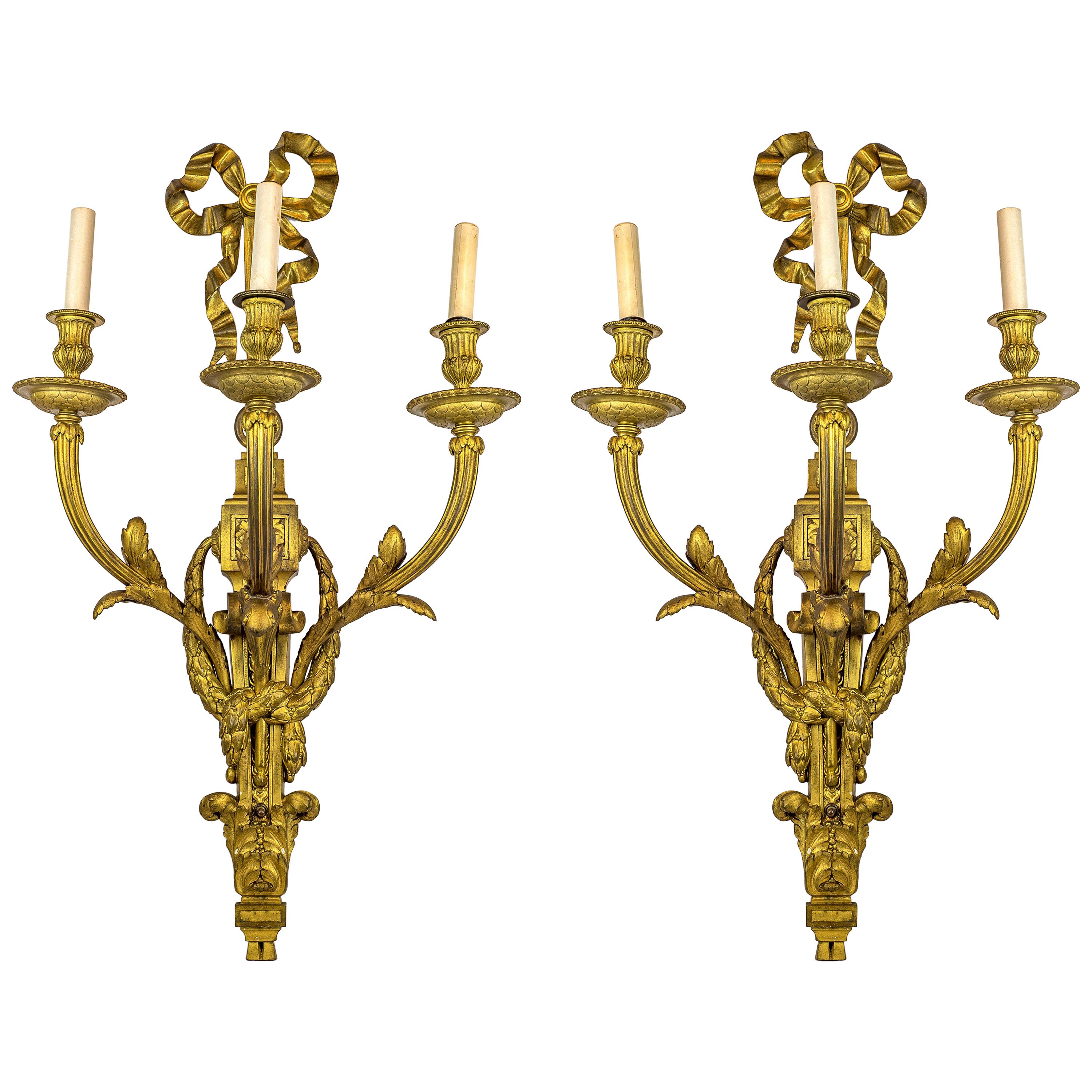 Pair of Gilt Bronze Louis XVI Style Three-Light Wall Light Sconces