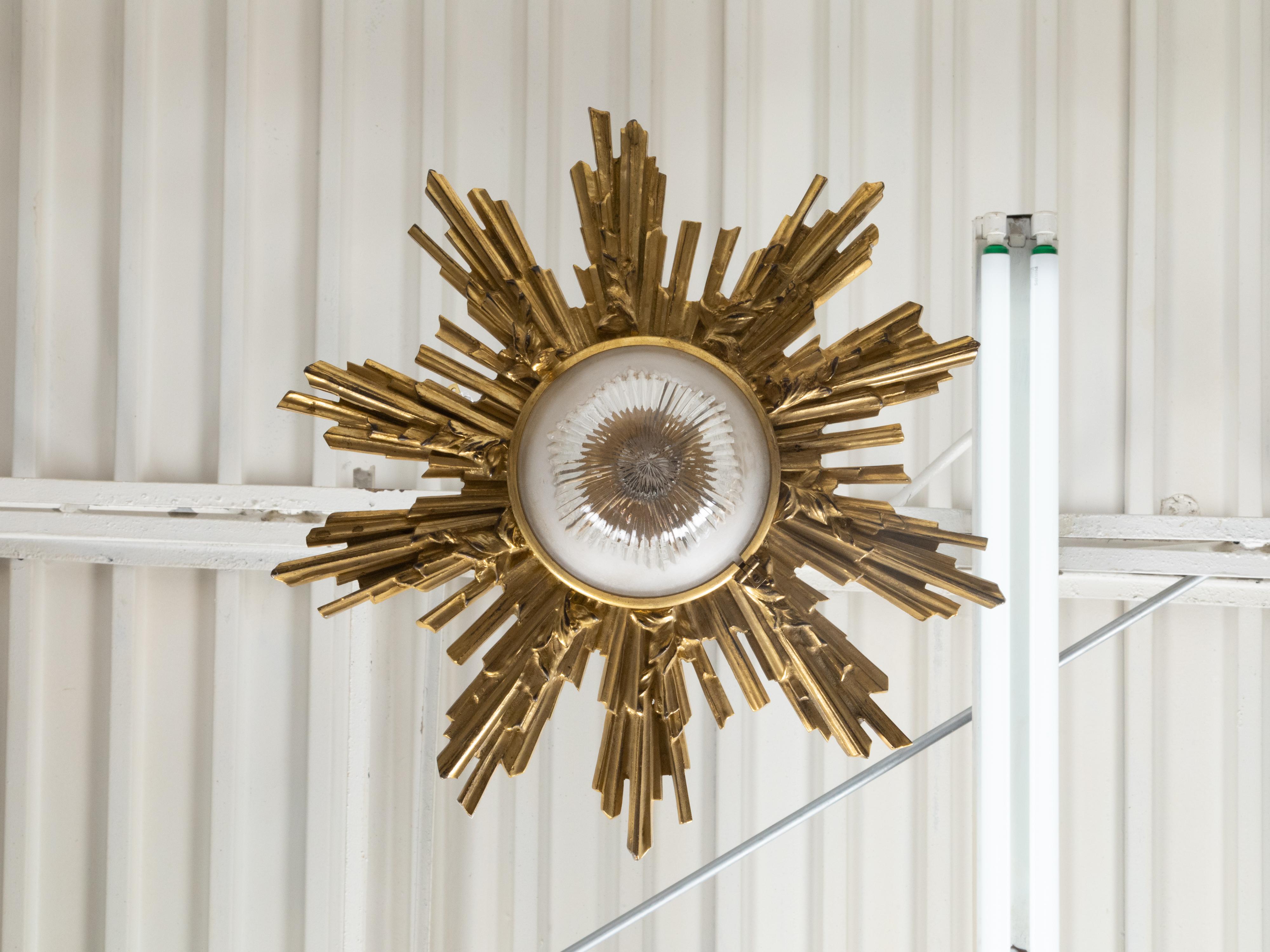 Mid-Century Modern Pair of Gilt Bronze Midcentury Sunburst Light Fixtures with Frosted Glass For Sale