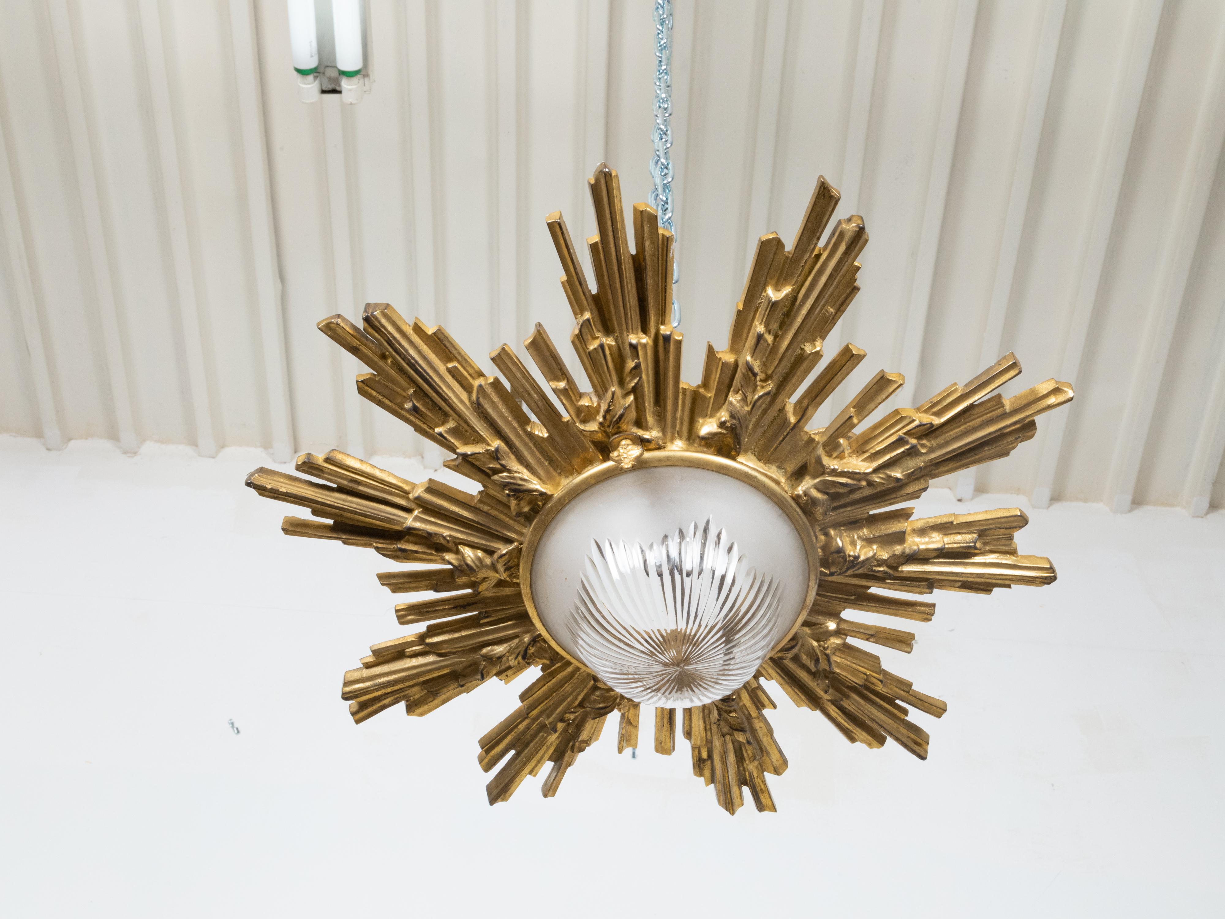 Cut Glass Pair of Gilt Bronze Midcentury Sunburst Light Fixtures with Frosted Glass For Sale