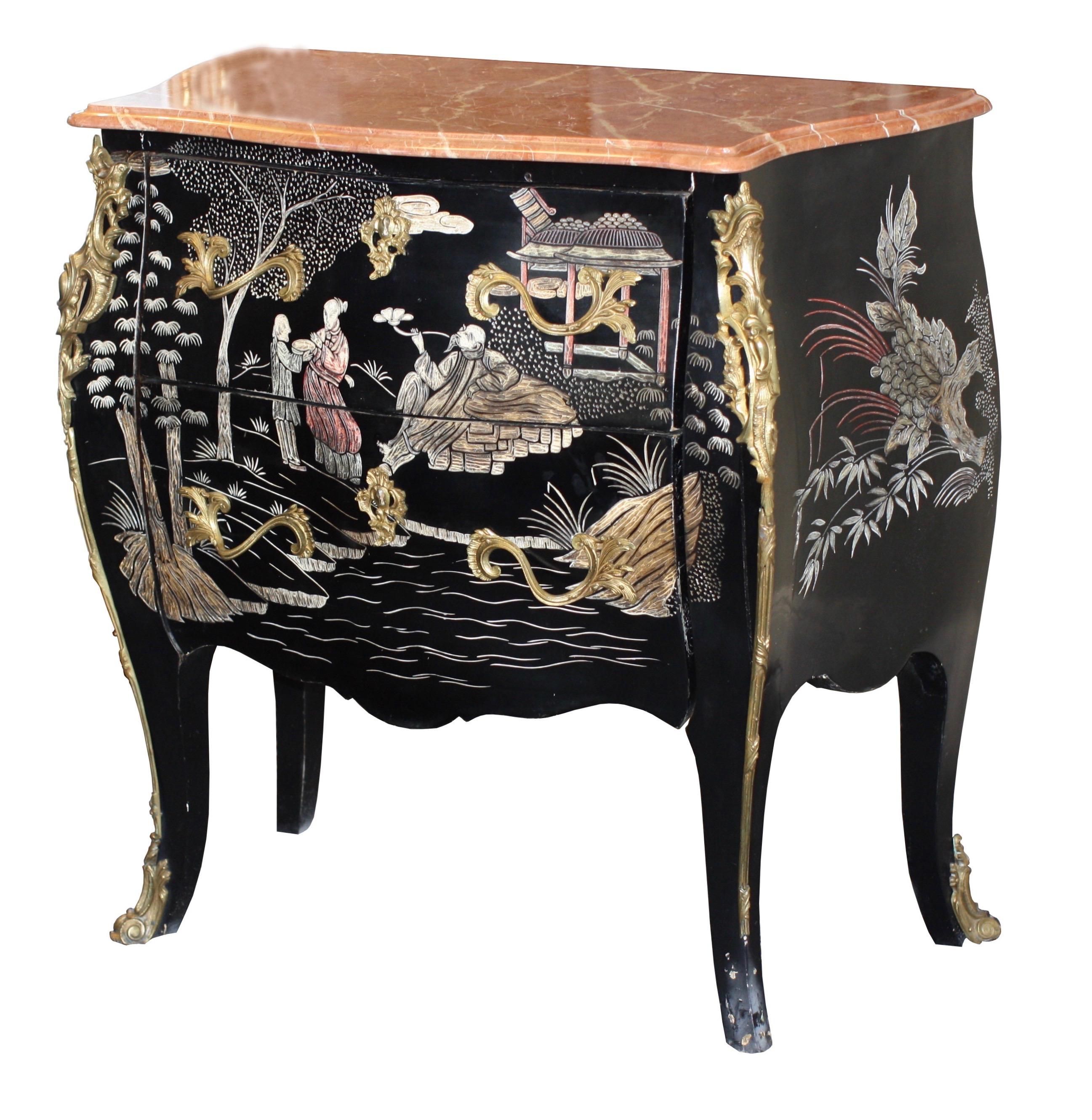 A pair of gilt bronze-mounted black and polychrome lacquered chinoiserie commodes,
of a concave serpentine form with marble tops above two serpentine long drawers with a shaped apron on cabriole legs terminating in gilt bronze scrolled feet, the