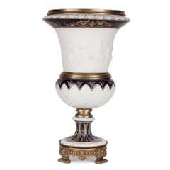 Pair of Gilt Bronze Mounted Krater-Form Bisque Porcelain Vases