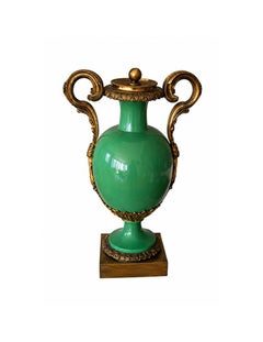 Pair of gilt-bronze mounted porcelain urns