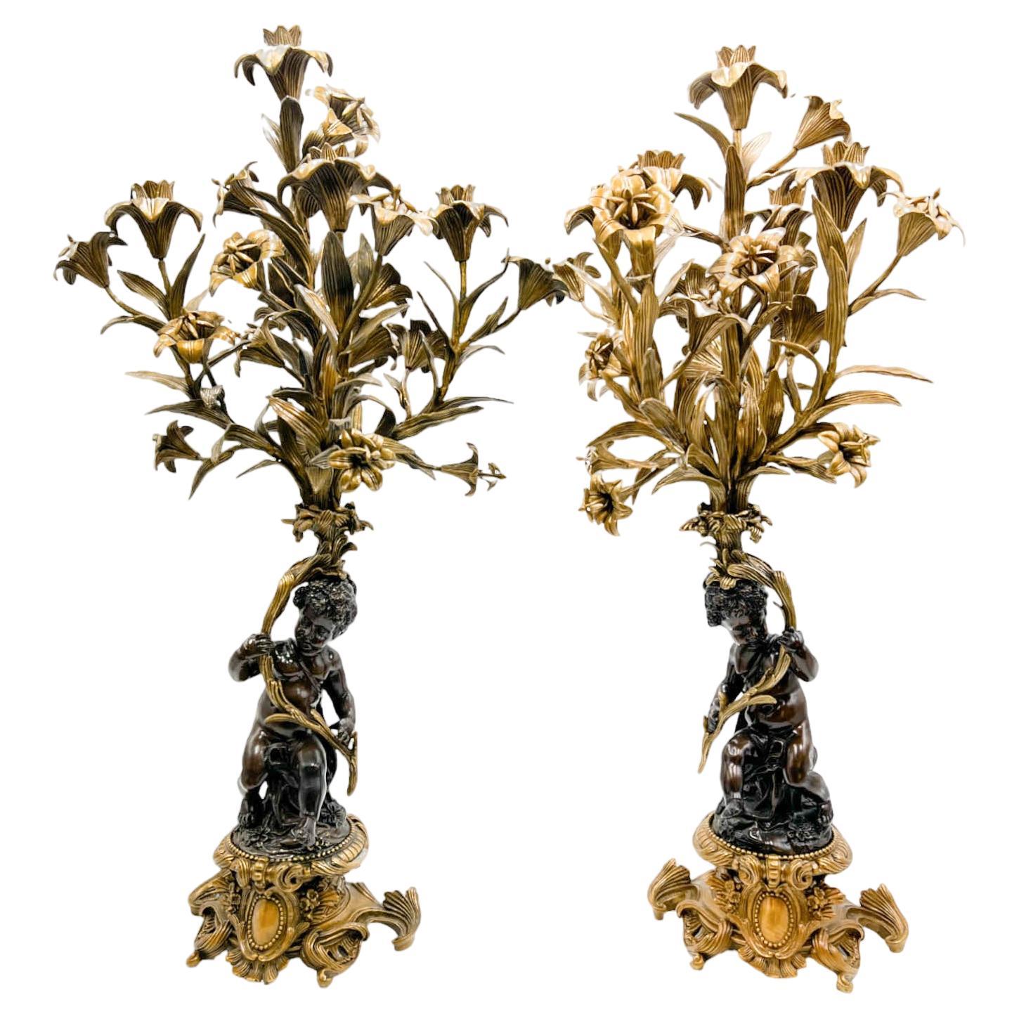 Pair of Gilt Bronze Mounted Putto 5-Arm Candelabra by United Wilson For Sale