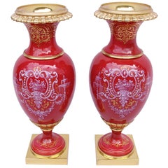 Pair of small vases in red porcelain and gilt bronze, circa 1900