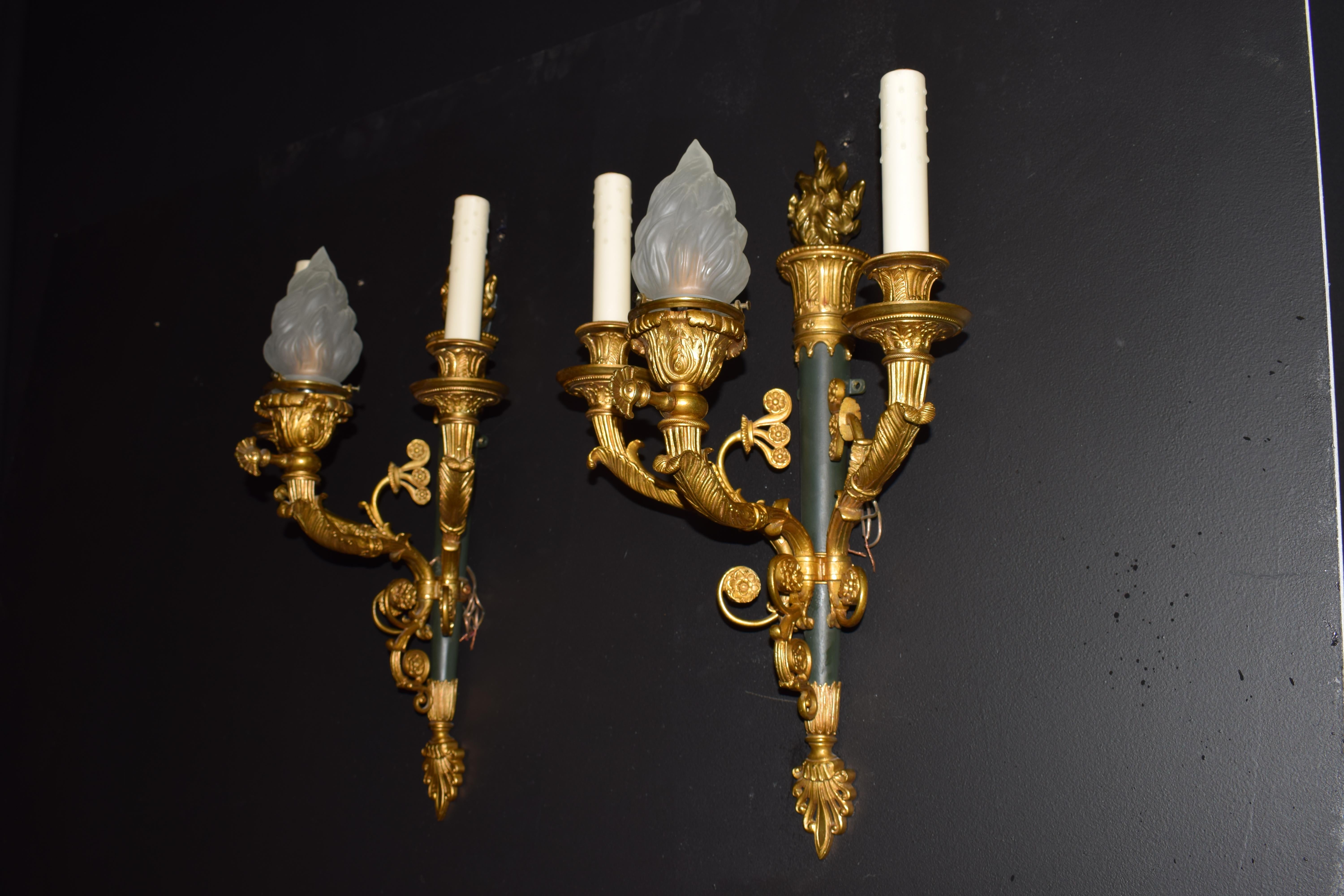 A magnificent pair of gilt bronze and patinated bronze wall sconces. 3-light
France, circa 1900
Dimensions: Height 21