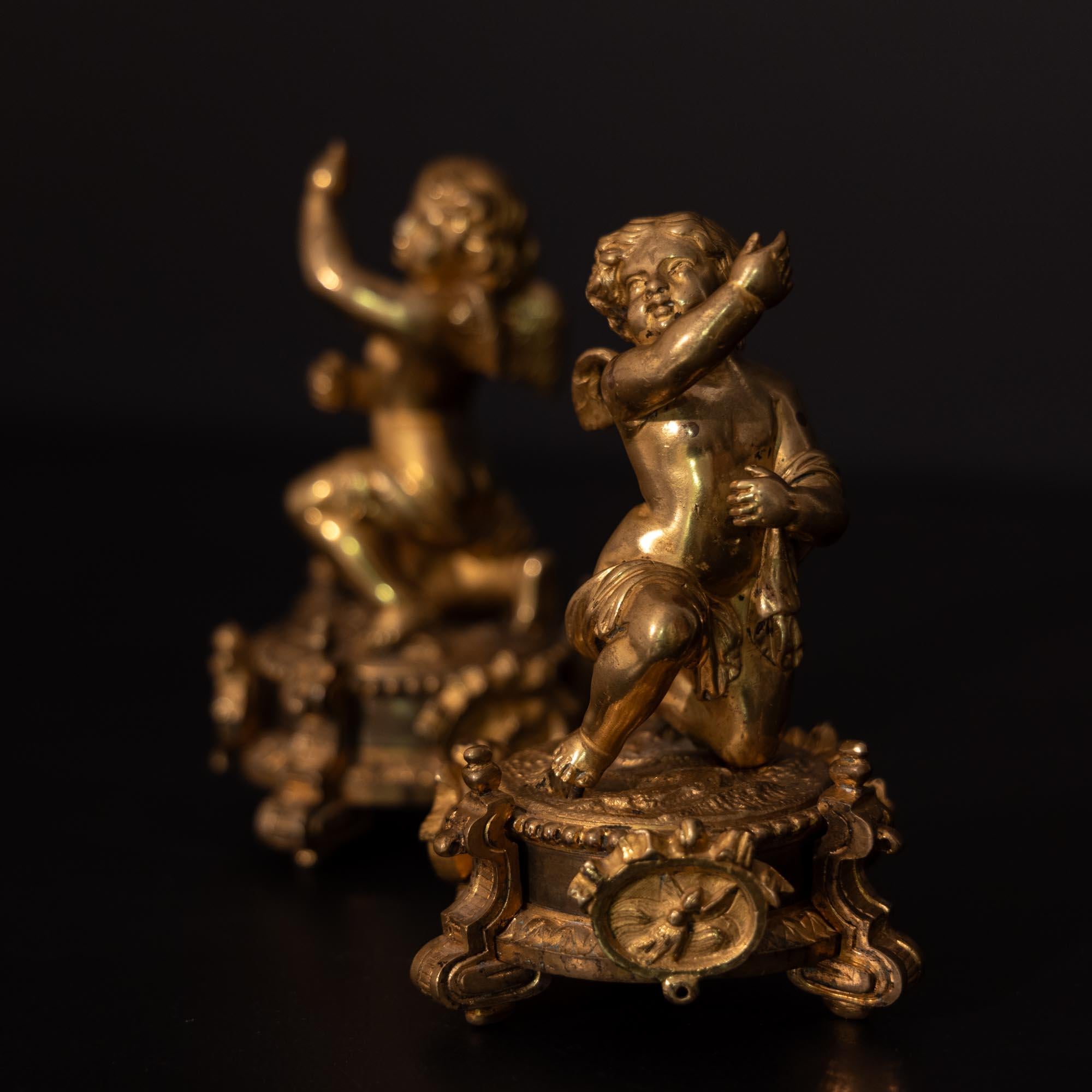 French Pair of gilt Bronze Putti on Pedestals, probably France, Late 18th Century