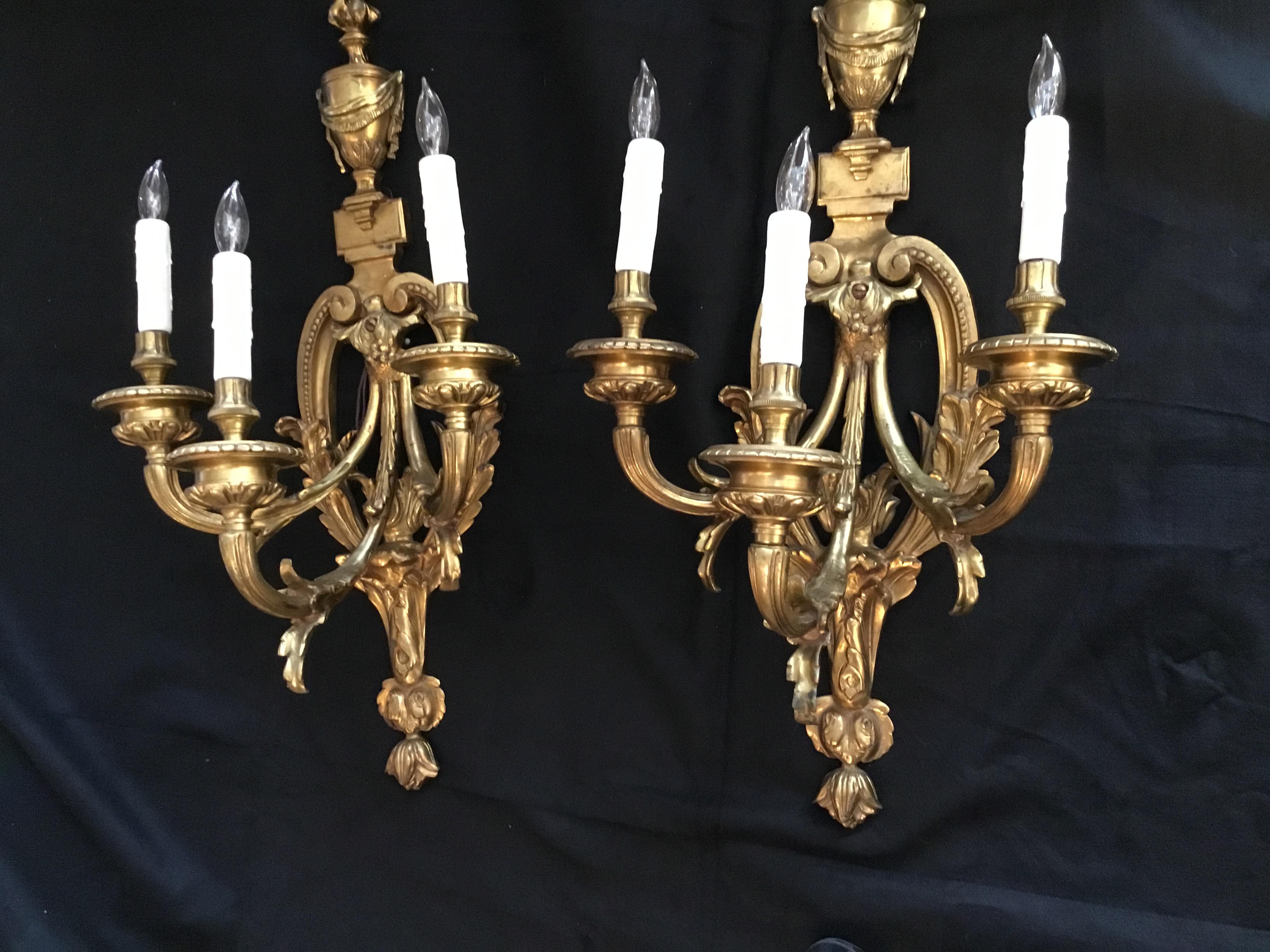 Handsome pair of large and impressive sconces.