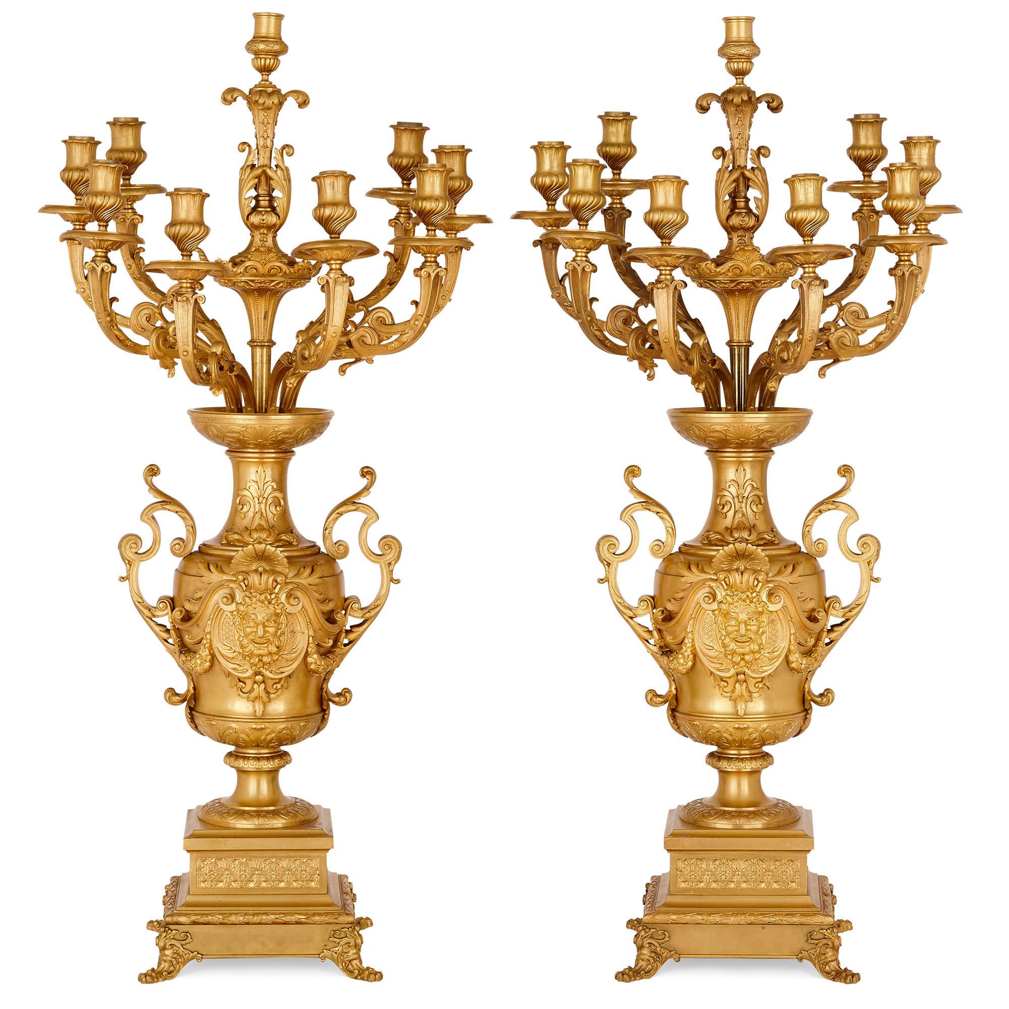 Pair of gilt bronze table candelabra by Ferdinand Barbedienne
French, late 19th century
Measures: Height 97cm, width 46cm, depth 35cm

These large and finely cast candelabra were made by the well respected bronzier Ferdinand Barbedienne and are