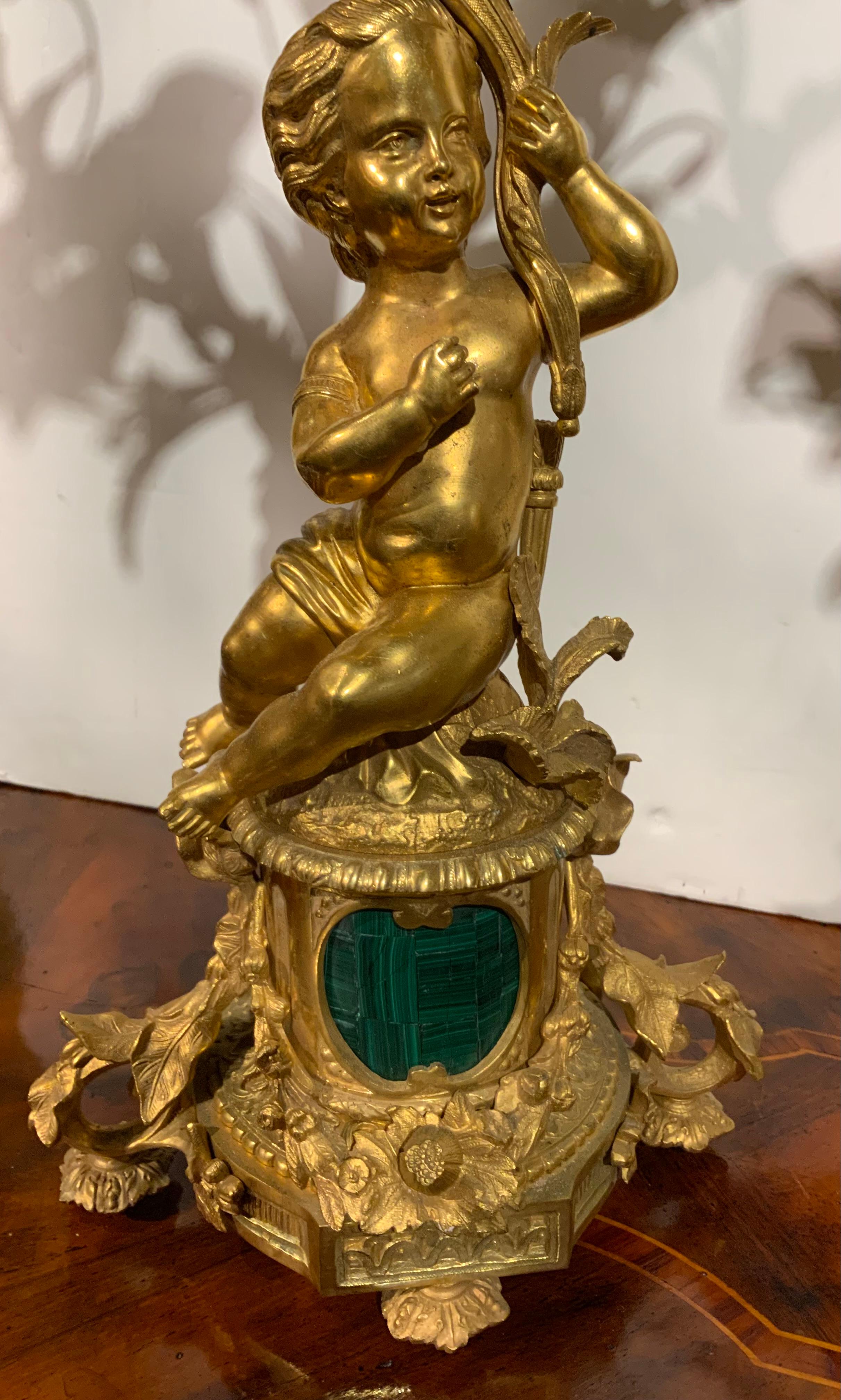 Pair of gilt bronze three lights each with putti, malachite centered at base For Sale 2